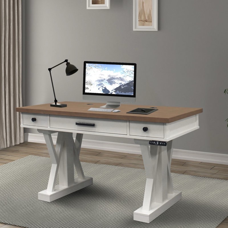 Kelsie-Leigh 6.5" H x 56" W Adjustable Height Farmhouse Wooden Desk in Cream with Sable Finish Table Top, 3 Drawers with Iron Handles, Underneath Electric Mechanism. Chip in middle base of Table Top, Mechanism Brand New, minor cosmetic mark on side of leg. 2 Boxes Total. 56'' W X 28'' D