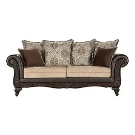 Elmbrook Brown Upholstered Rolled Arm 2 Seat Sofa with Intricate Wood Carved Frame, Vegan Leather Upholstery, Soft Linen Cushioning, Decorative Pillows Included. Product Depth (in.) 38 in Product Height (in.) 40 in Product Width (in.) 93 in