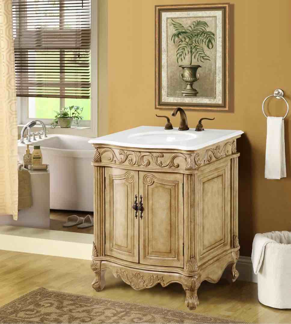 Danville 30" Single Bathroom Vanity and Sink. Tall Tan Floral Carved 2 Door Cabinet With Single White Quartz Sink Top, Antique Bronze Knobs, Vanity Width: 27" (left to right) Vanity Height: 35" (top to bottom) Vanity Depth: 21" (front to back). 3 Hole 8” Faucet Centers.