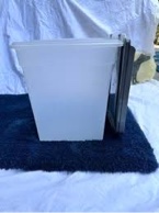 two dog food containers with lids