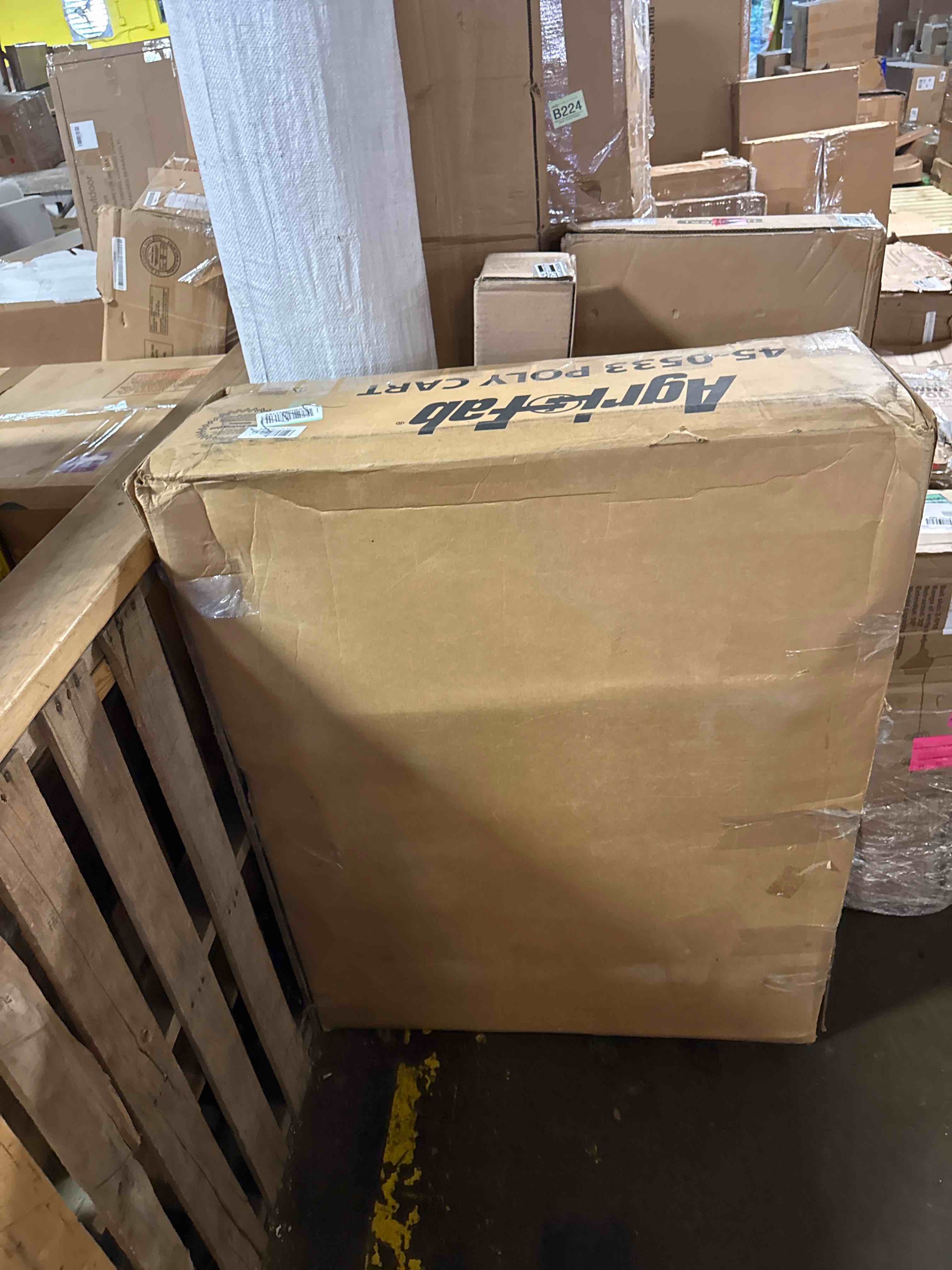 Condition photo showing New/Like New for agri-fab 45-0533 650 lbs tow behind poly dump cart, 10 cu. ft.; lawn & garden cart/trailer for lawn mowers, 16" pneumatics tires, easy to use foot pedal dumping lever 650 lb. poly tow-behind dump cart