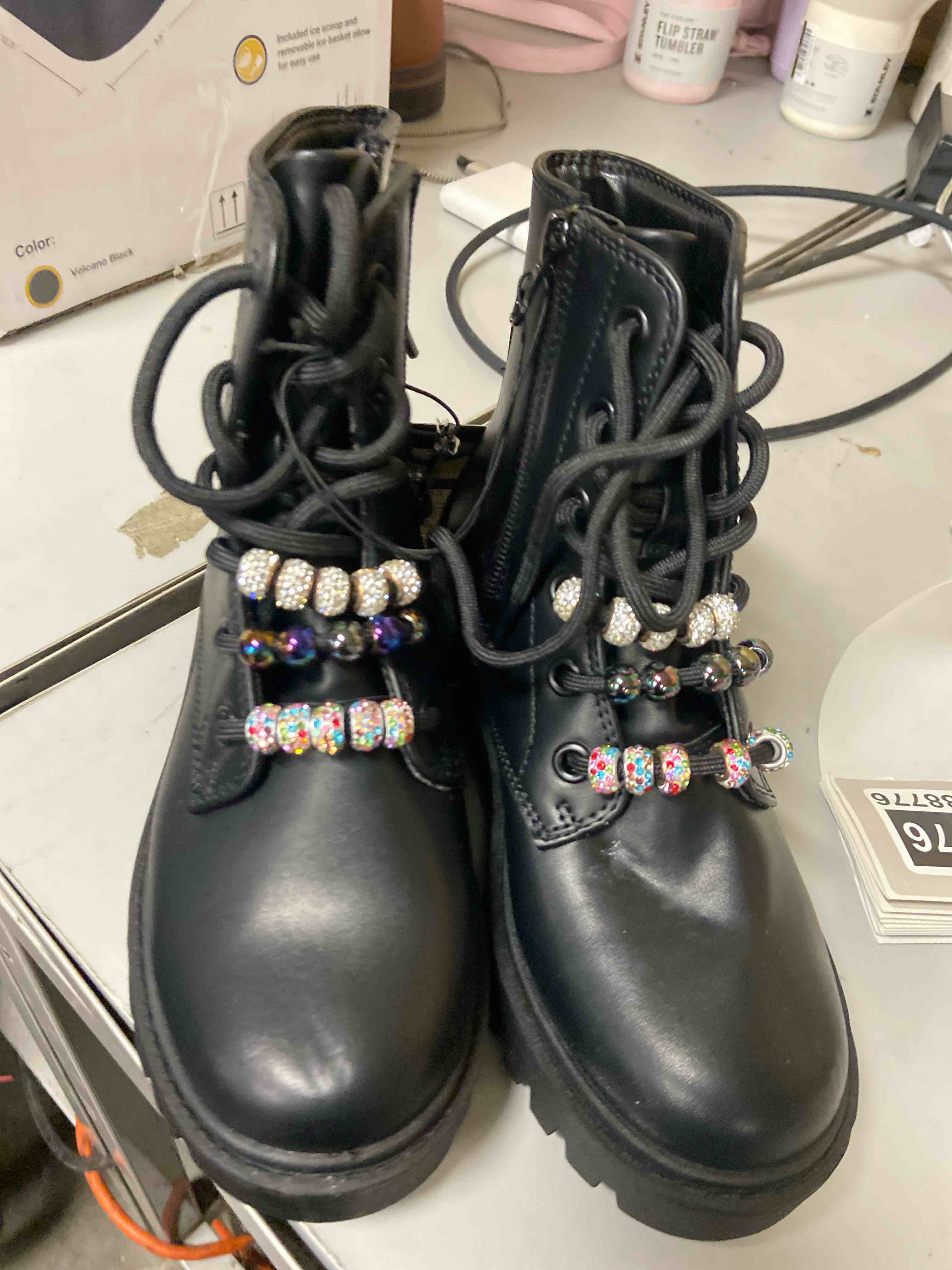 Condition photo showing New/Like New for kids' bronx lace-up combat boots - art class™ black 13: zipper closure, textured outsole, medium width