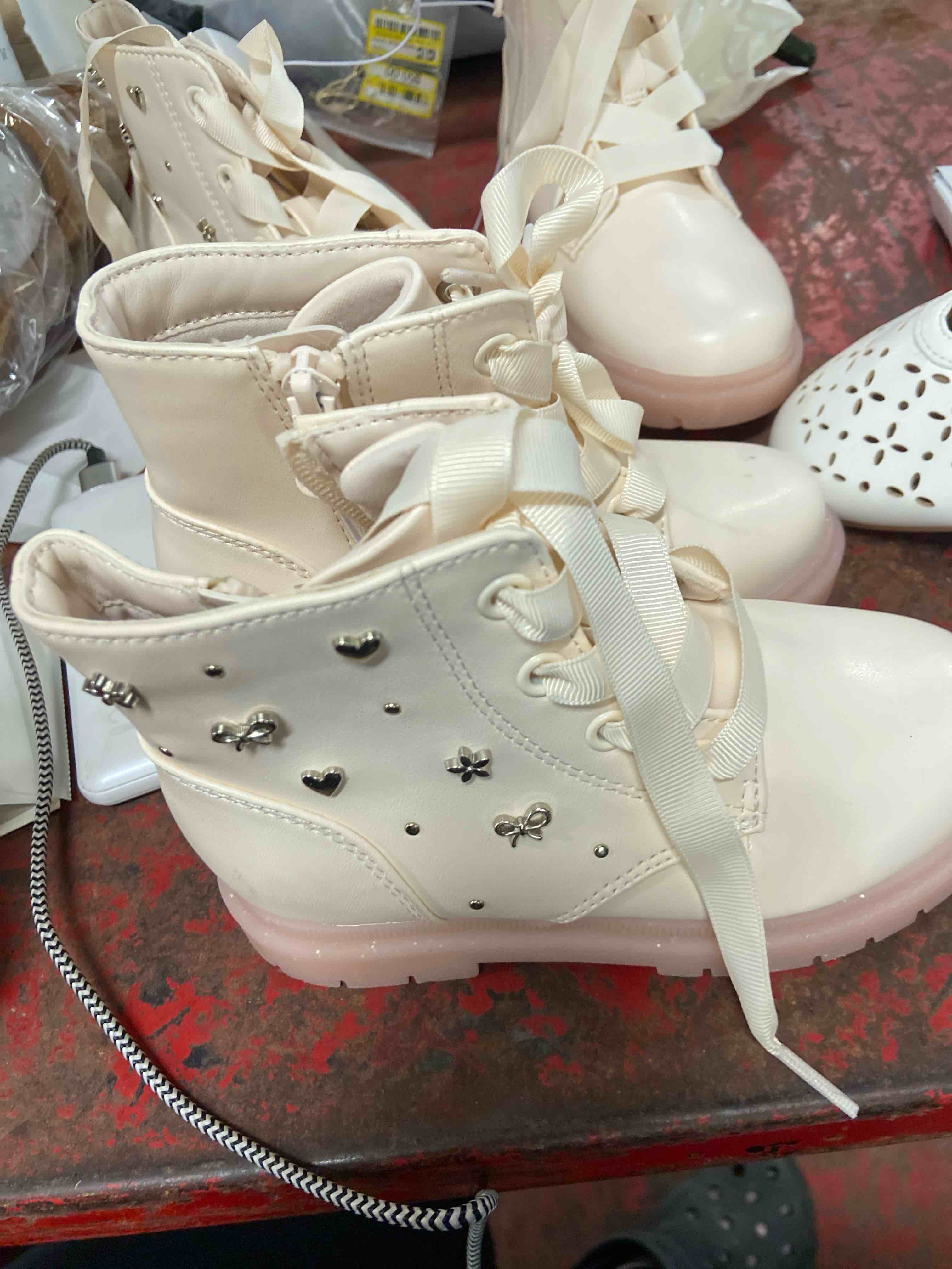 Condition photo showing New/Like New for toddler amaya lace-up combat boots - cat & jack™ ivory 10t: zipper closure, cushioned insole, flexible outsole