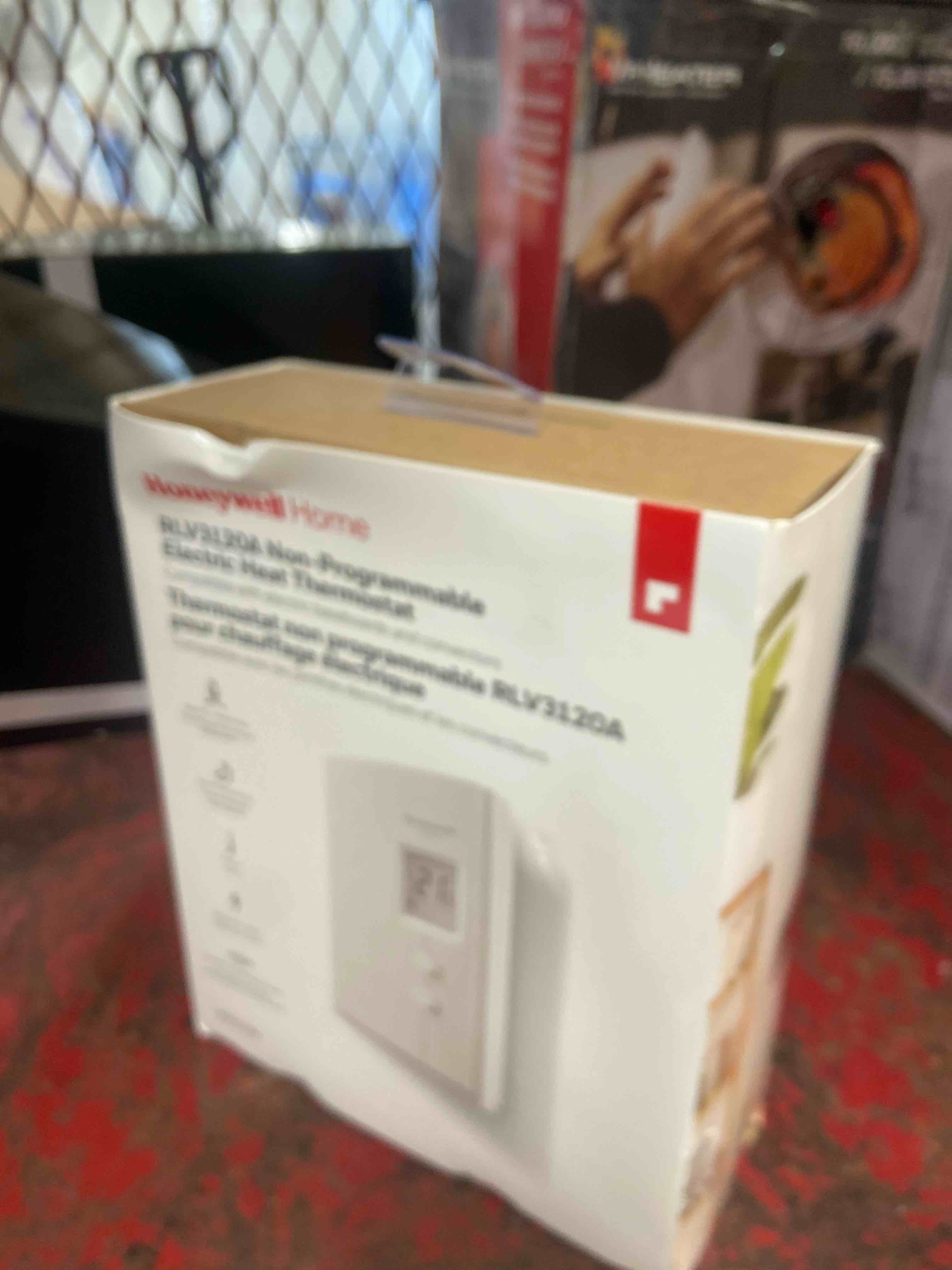 Condition photo showing New/Like New for honeywell home rlv3120a1005 digital non-programmable thermostat for electric heat only