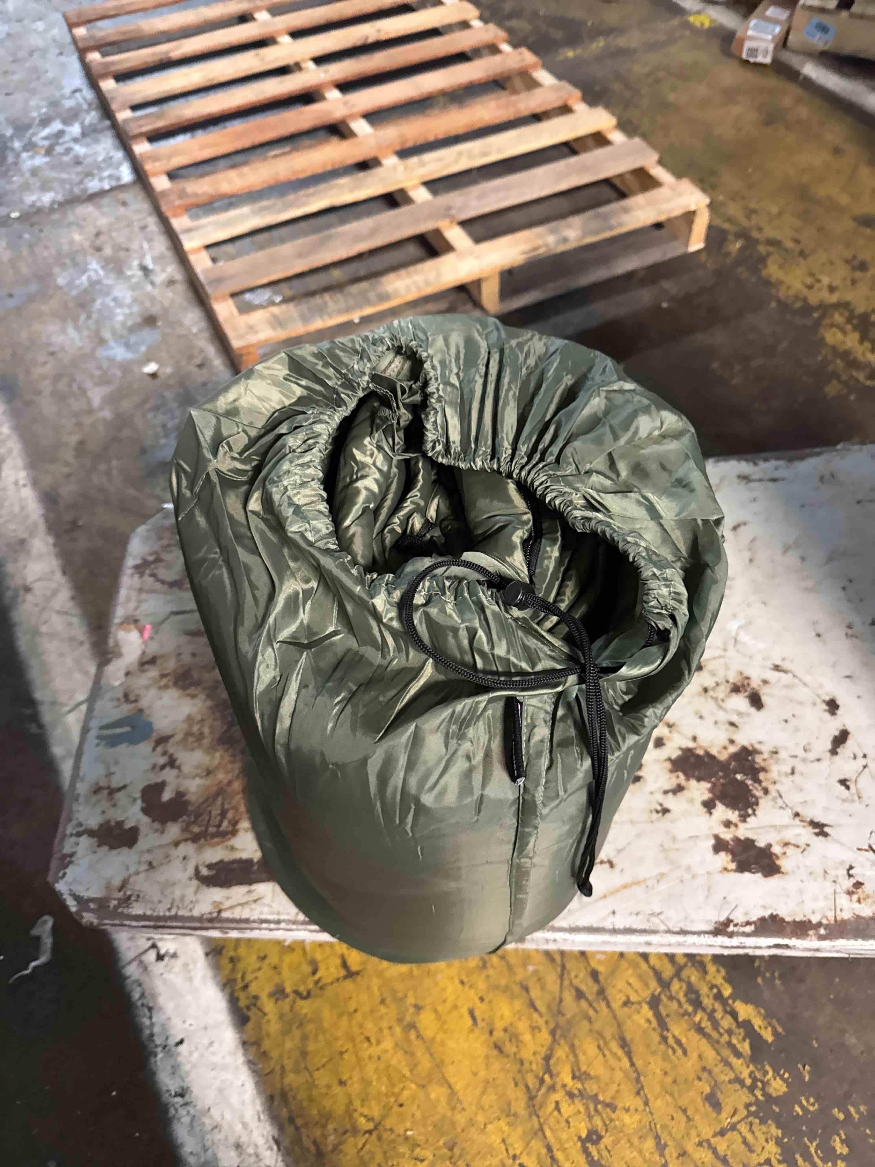 Condition photo showing New/Like New for genuine u.s. military waterproof wet weather bag, rubberized nylon clothing & gear storage bag, heavy-duty drawstring pack liner, laundry & camping bag, 30" x 23", usa made