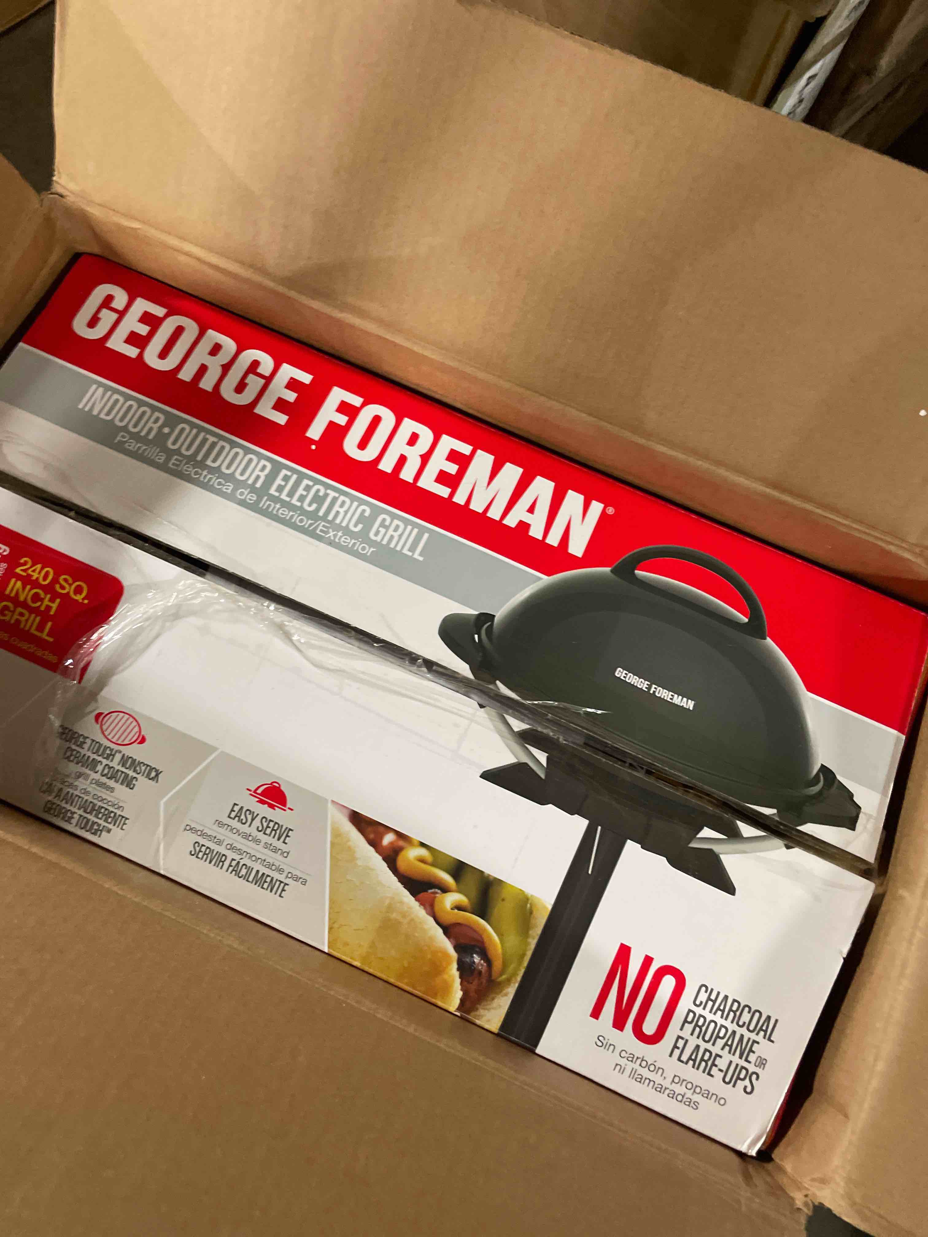 Condition photo showing As Is for george foreman indoor/outdoor electric patio grill, apartment approved, 15-serving, removable stand, black electric grill black