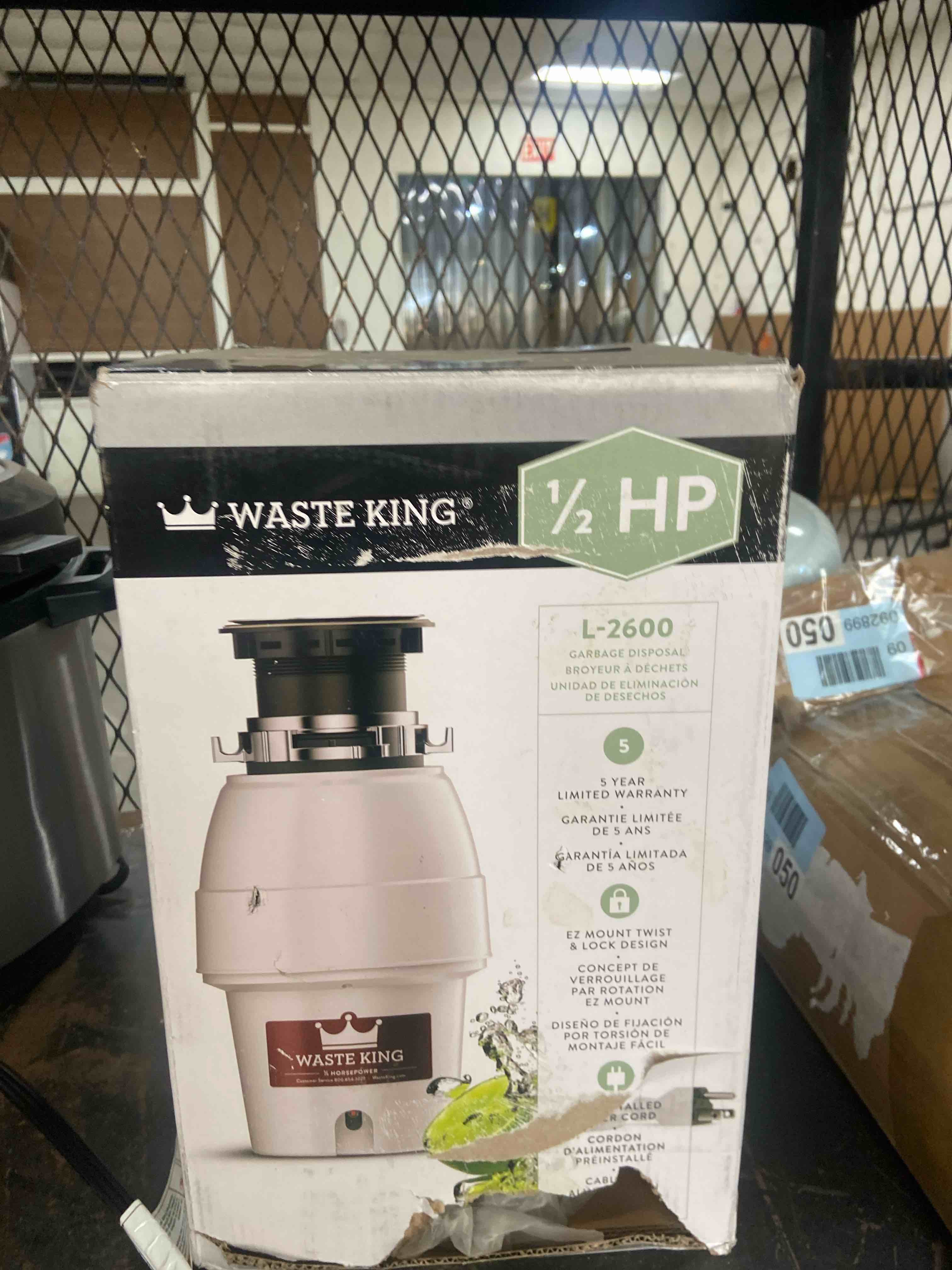 Condition photo showing New/Like New for waste king legend series continuous feed garbage disposal for kitchen sink with power cord, l-2600 1/2 hp - continuous feed disposal only 5 year warranty