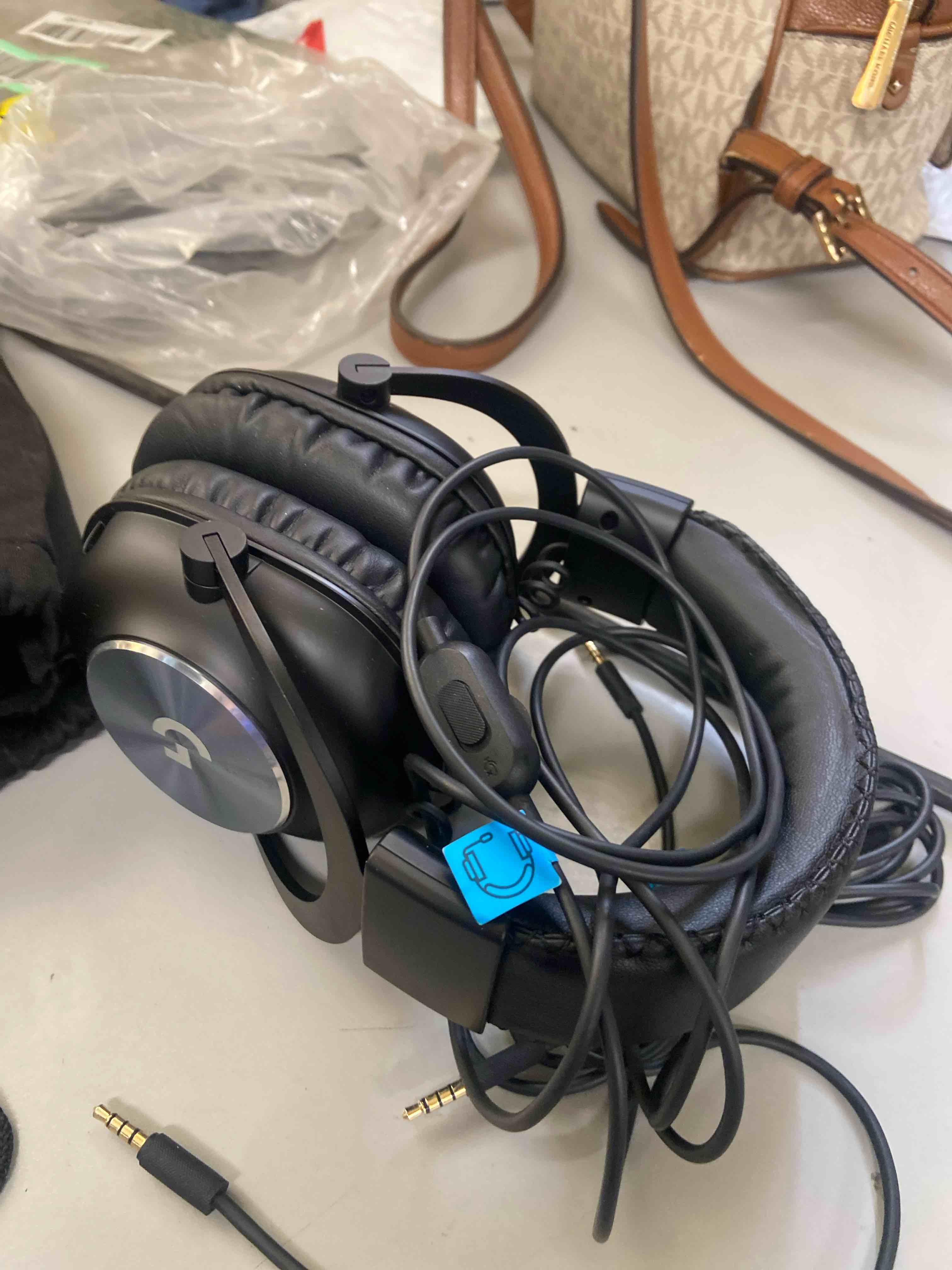 Condition photo showing New/Like New for logitech g pro x wired gaming headset: blue vo!ce detachable boom mic, dts 7.1, 50 mm drivers, usb/3.5mm aux, spare memory foam ear pads, usb dac & bag included - black wired classic headset wired