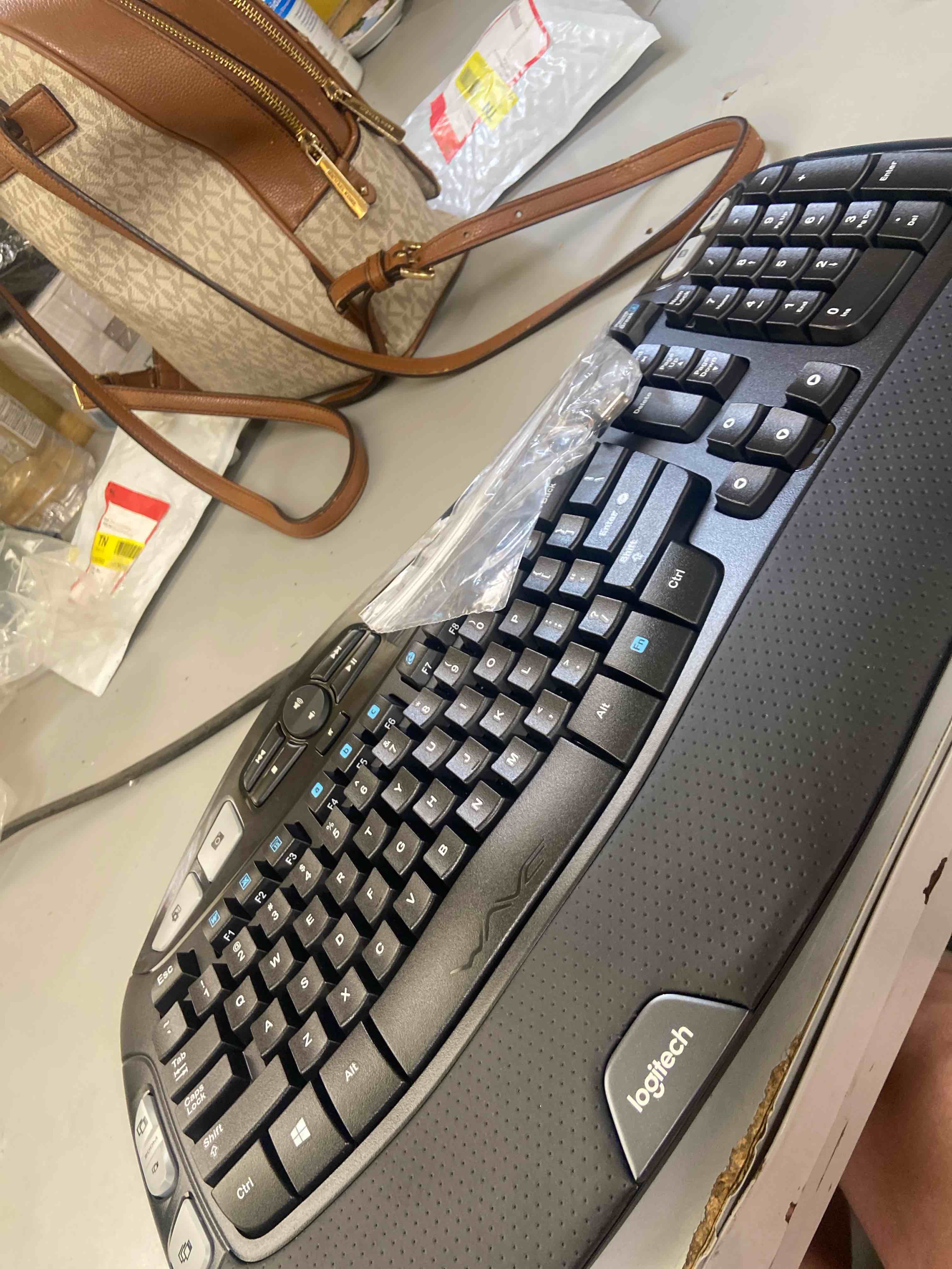 Condition photo showing New/Like New for logitech k350 wave ergonomic keyboard with unifying wireless technology - black