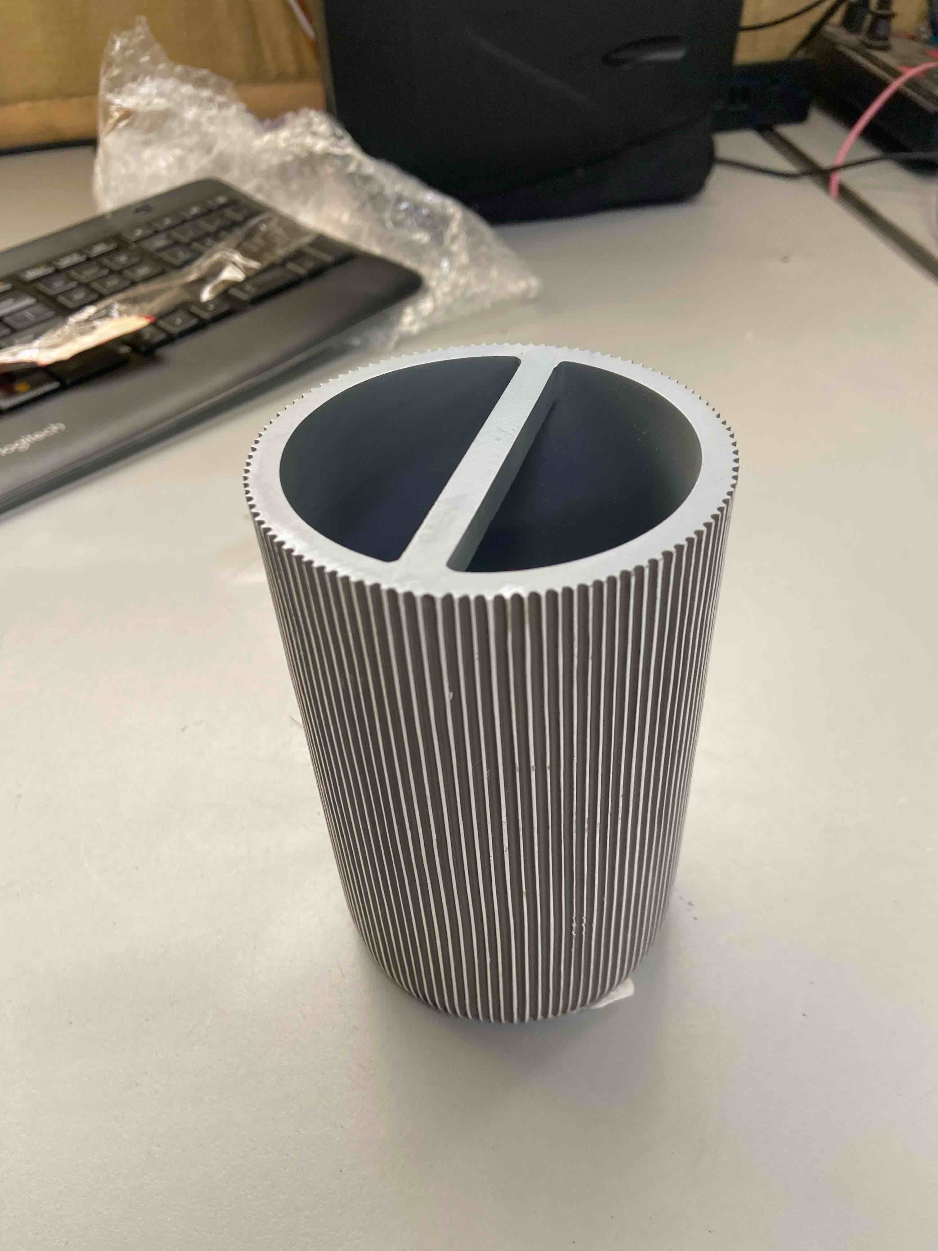 Condition photo showing New/Like New for the modern lined grey bath accessories - toothbrush holder