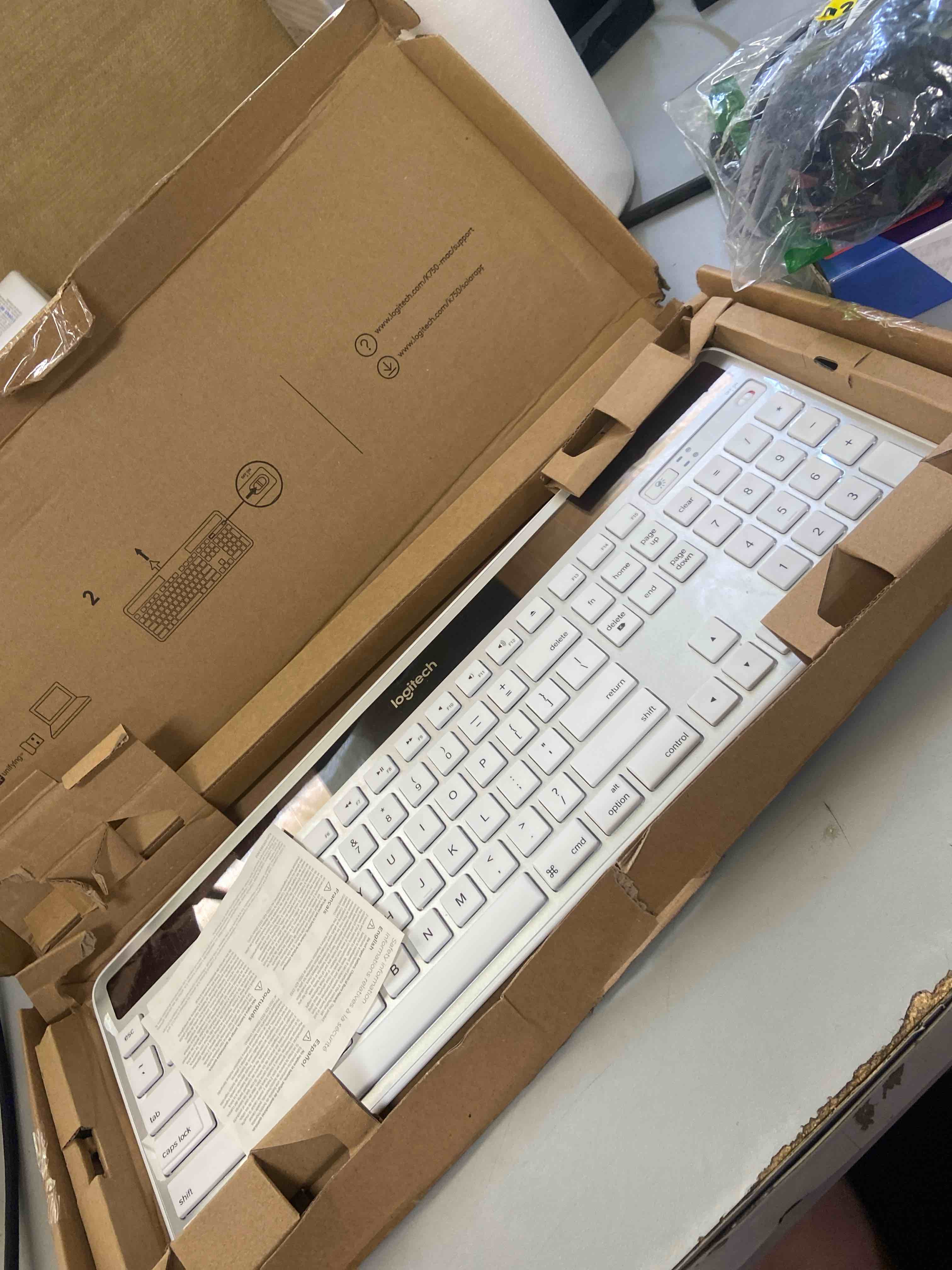 Condition photo showing New/Like New for logitech k750 solar wireless keyboard, mac