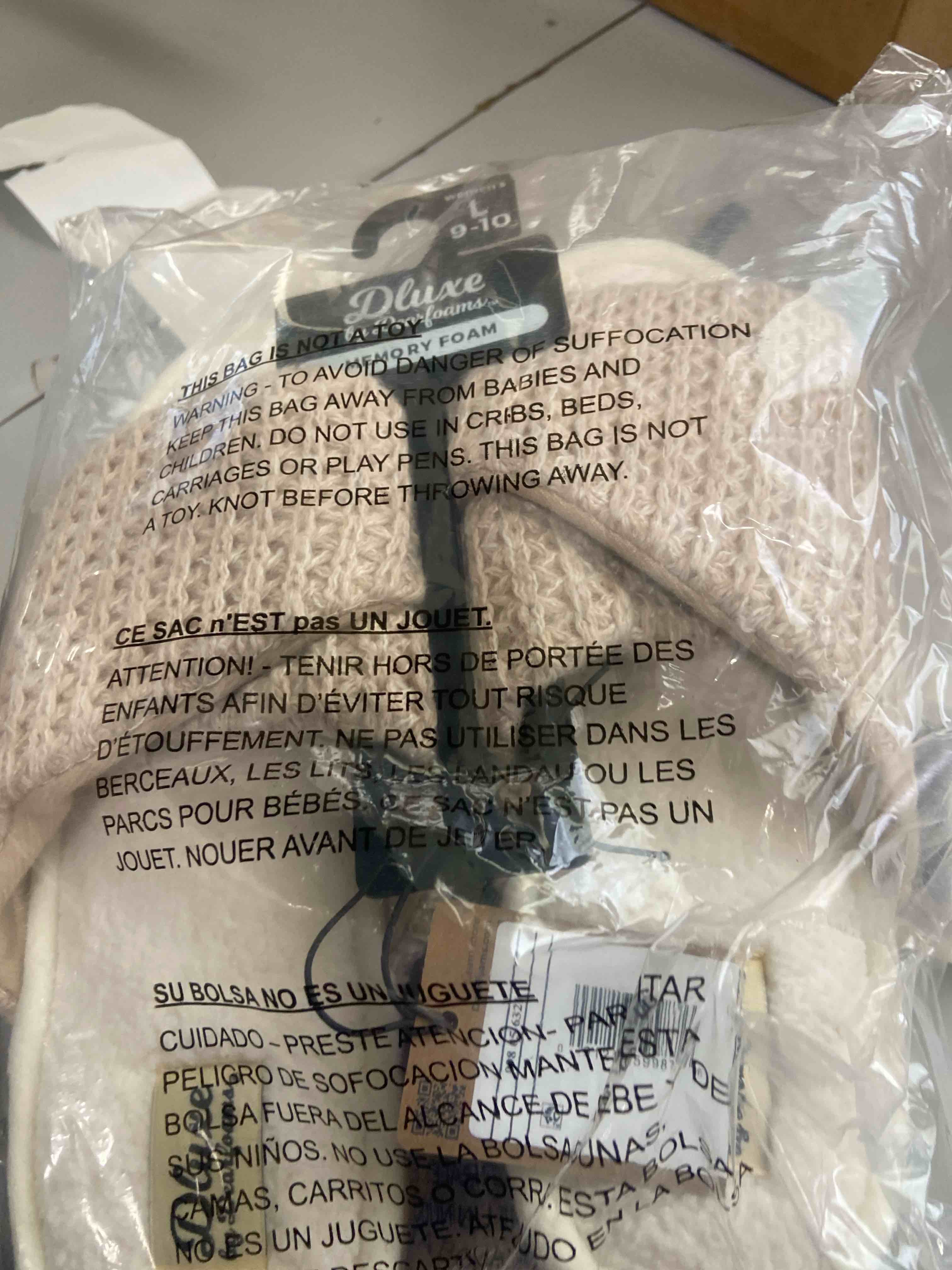 Condition photo showing New/Like New for dluxe by dearfoams women's zola knit twist vamp slide slippers - cream l