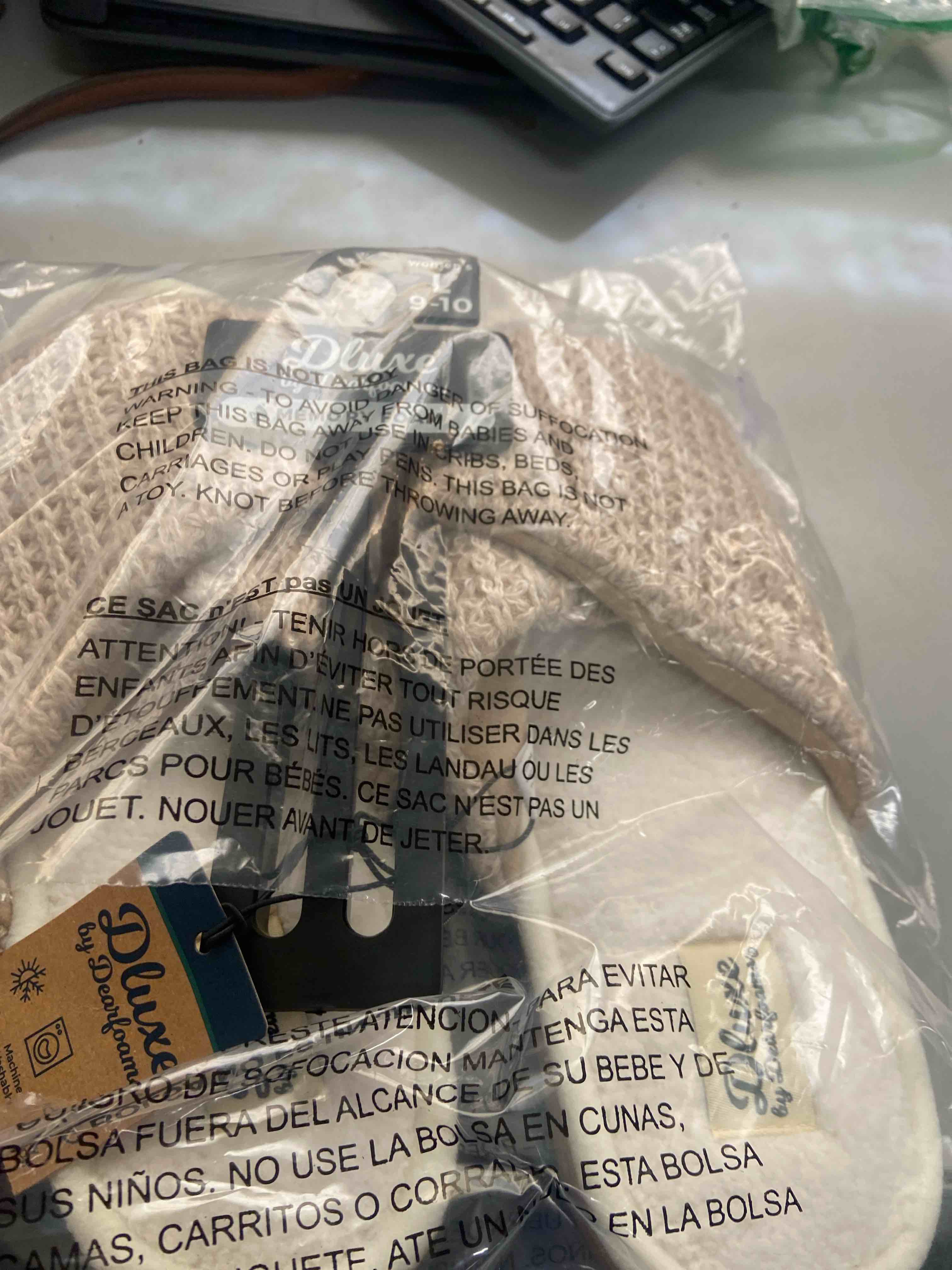 Condition photo showing New/Like New for dluxe by dearfoams women's zola knit twist vamp slide slippers - cream l