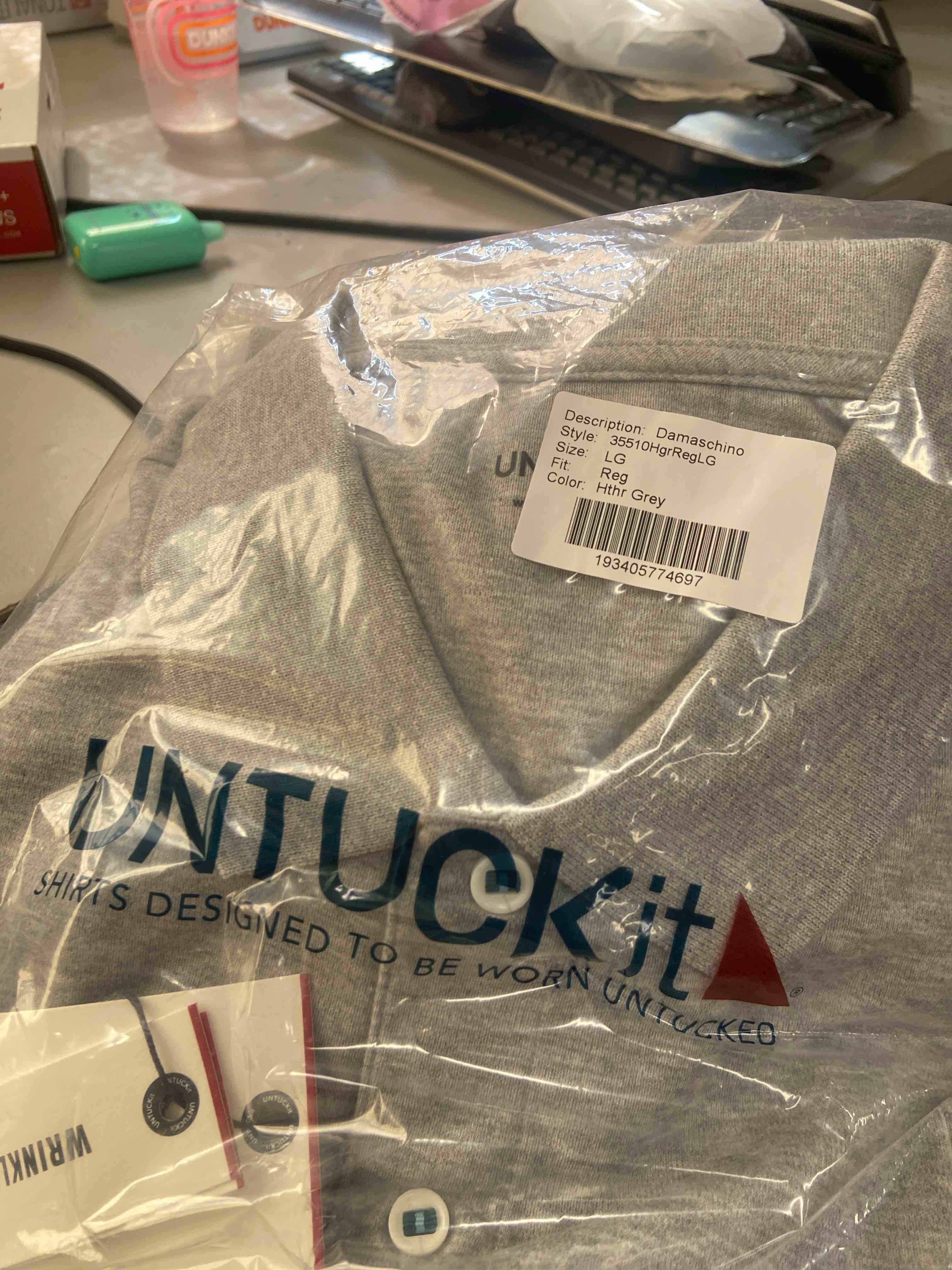 Condition photo showing New/Like New for untuckit short sleeve wrinkle free supima cotton polo shirts for men