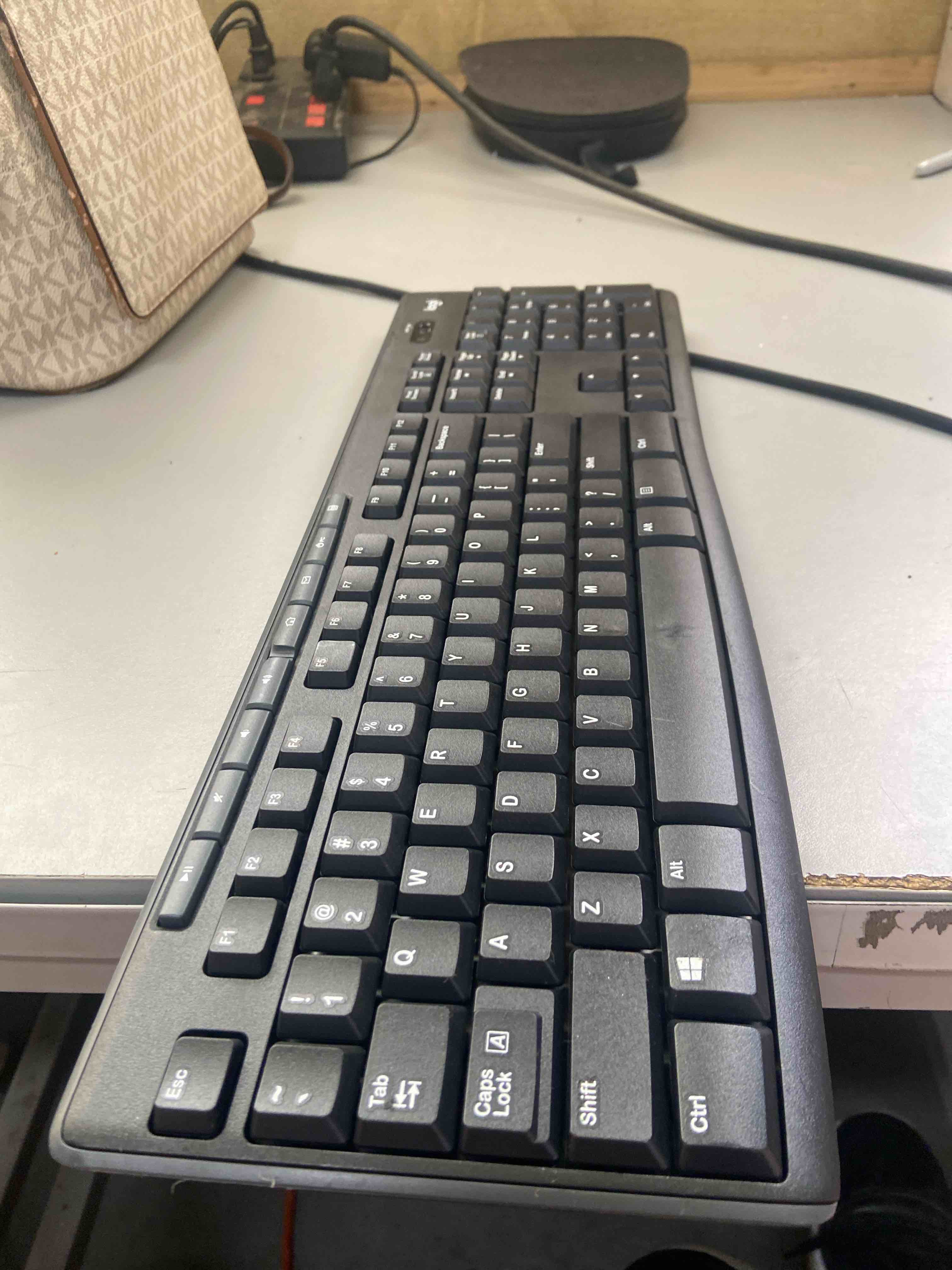 Condition photo showing Good Condition for logitech mk295 wireless mouse & keyboard combo with silenttouch technology, full numpad, advanced optical tracking, lag-free wireless, 90% less noise - graphite. keyboard only 