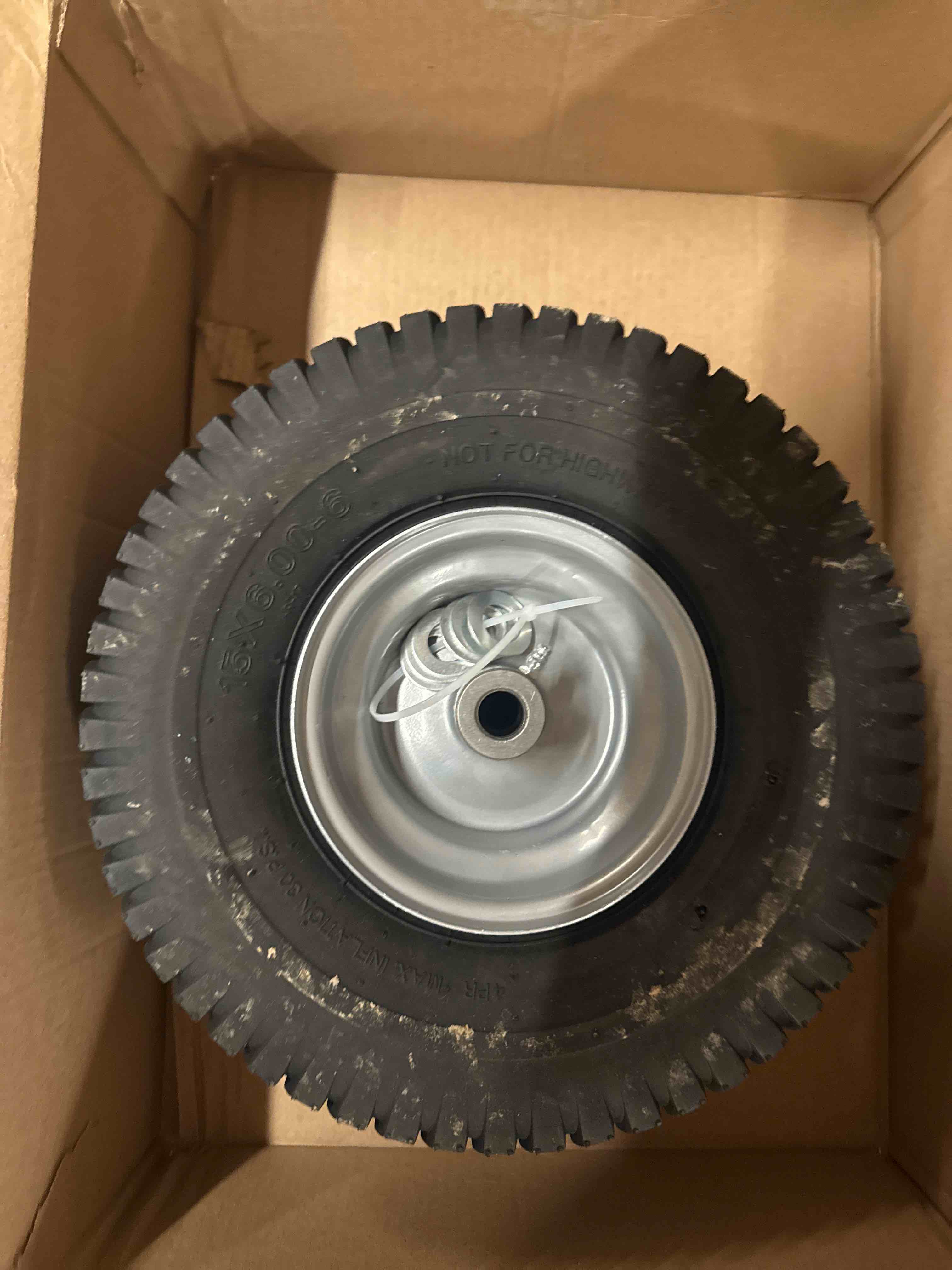 Condition photo showing Good Condition for (one)15x6.00-6 lawn mower tires and wheel, tire assembly replacement for riding lawn mower front tires, 3/4" bearing, 3" centered hub, 4 ply pneumatic