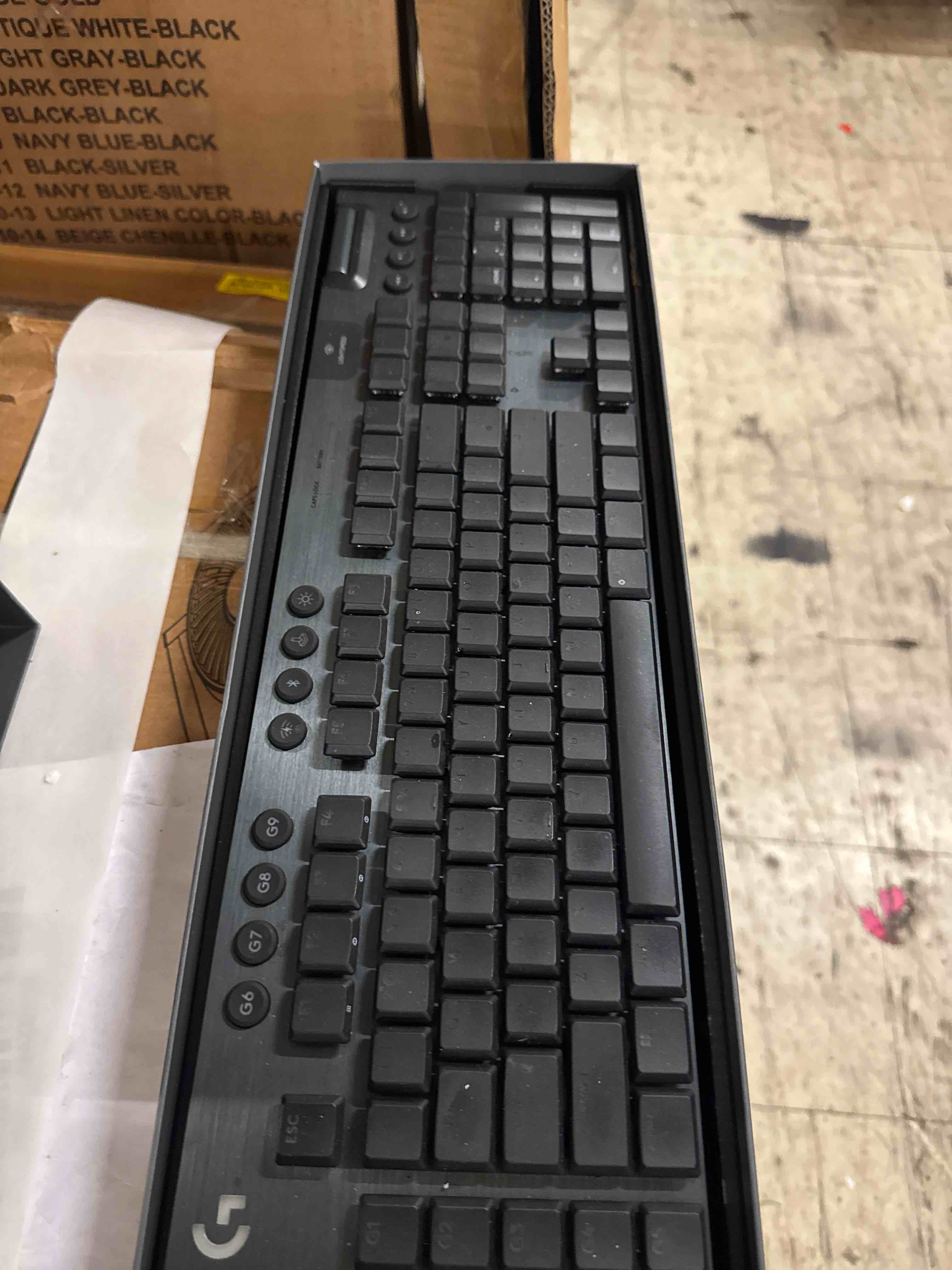 Condition photo showing As Is for logitech g915 x lightspeed low-profile wireless gaming keyboard, double-shot pbt keycaps, fully programmable keys, rgb backlighting, sleek aluminum finishing, gl red linear switches - pc/mac - black