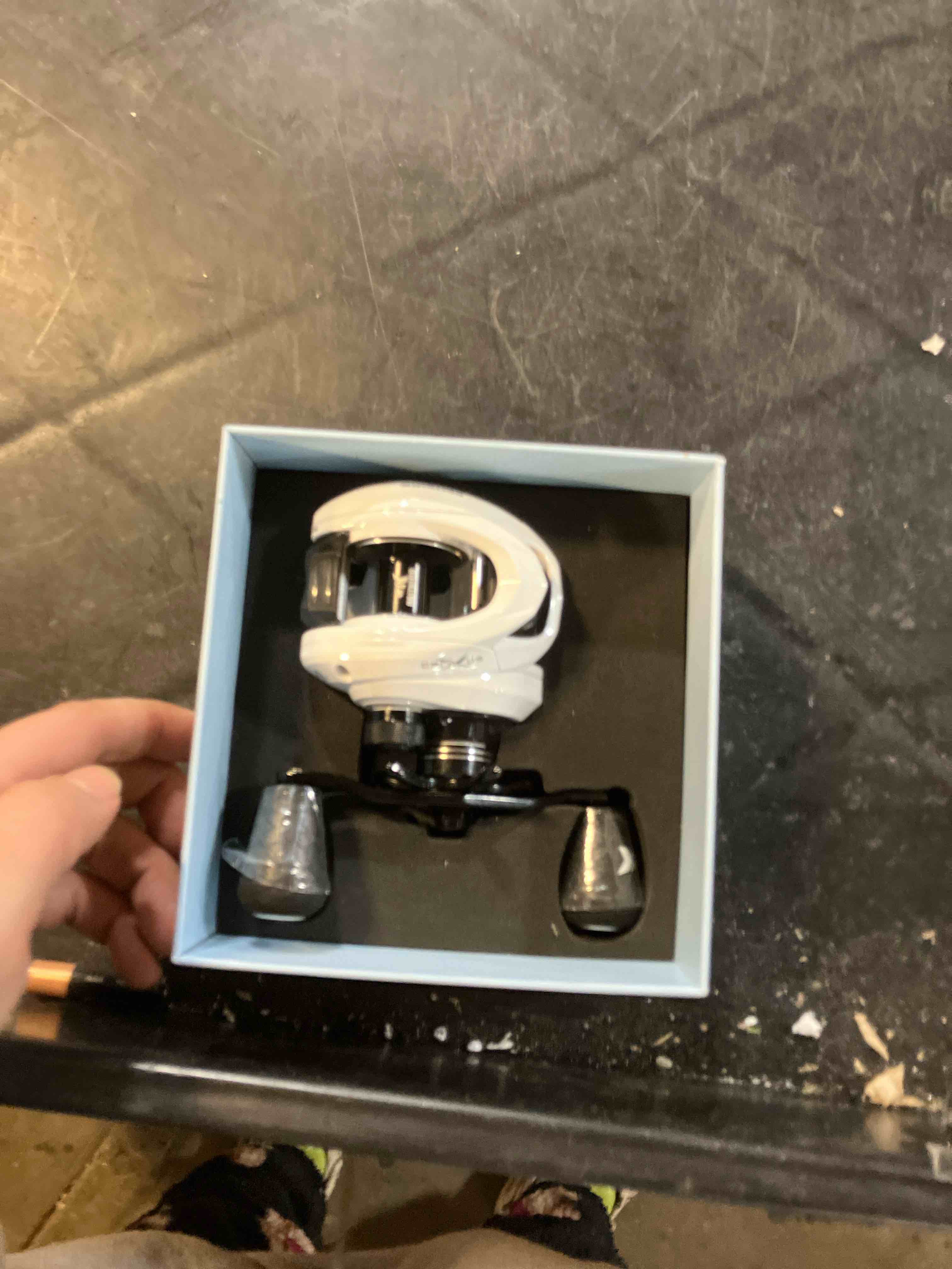 Condition photo showing Good Condition for KastKing Crixus Baitcasting Reels, 6.5:1/7.2:1 Gear Ratio Fishing Reels, 17.6lbs Carbon Disc Drag, Super Polymer Grips,Carbon Infused Nylon Frame,8-pc Magnetic Brake, Low Profile Reel. A: Glacier White-Right-6.5:1