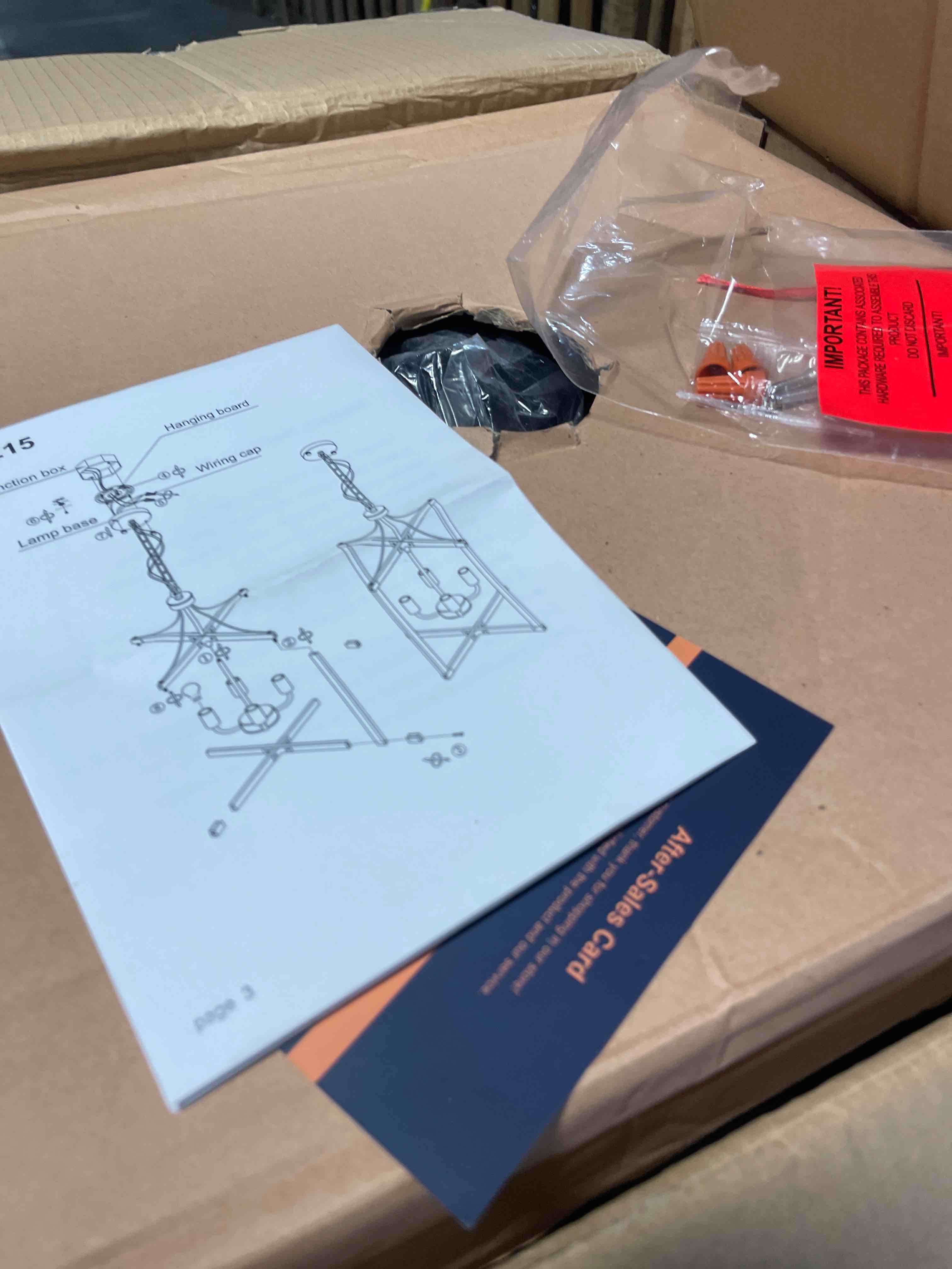 Condition photo showing As Is for 4-light lantern-style chandelier. 