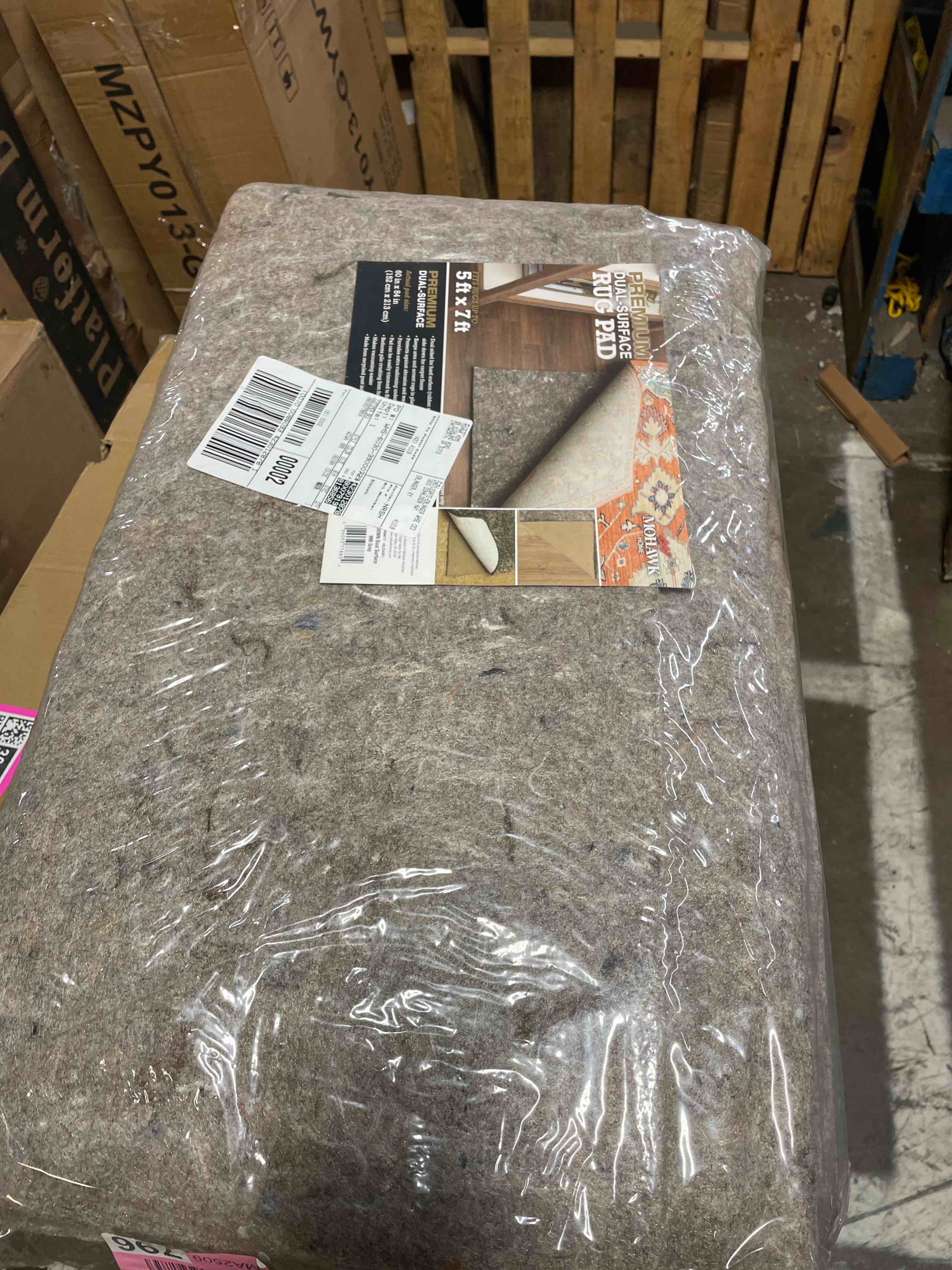 Condition photo showing New/Like New for mohawk home 5' x 7' premium luxury non slip rug pad 1/4 thick dual surface felt + rubber gripper - safe for all floors, synthetic fiber, grey