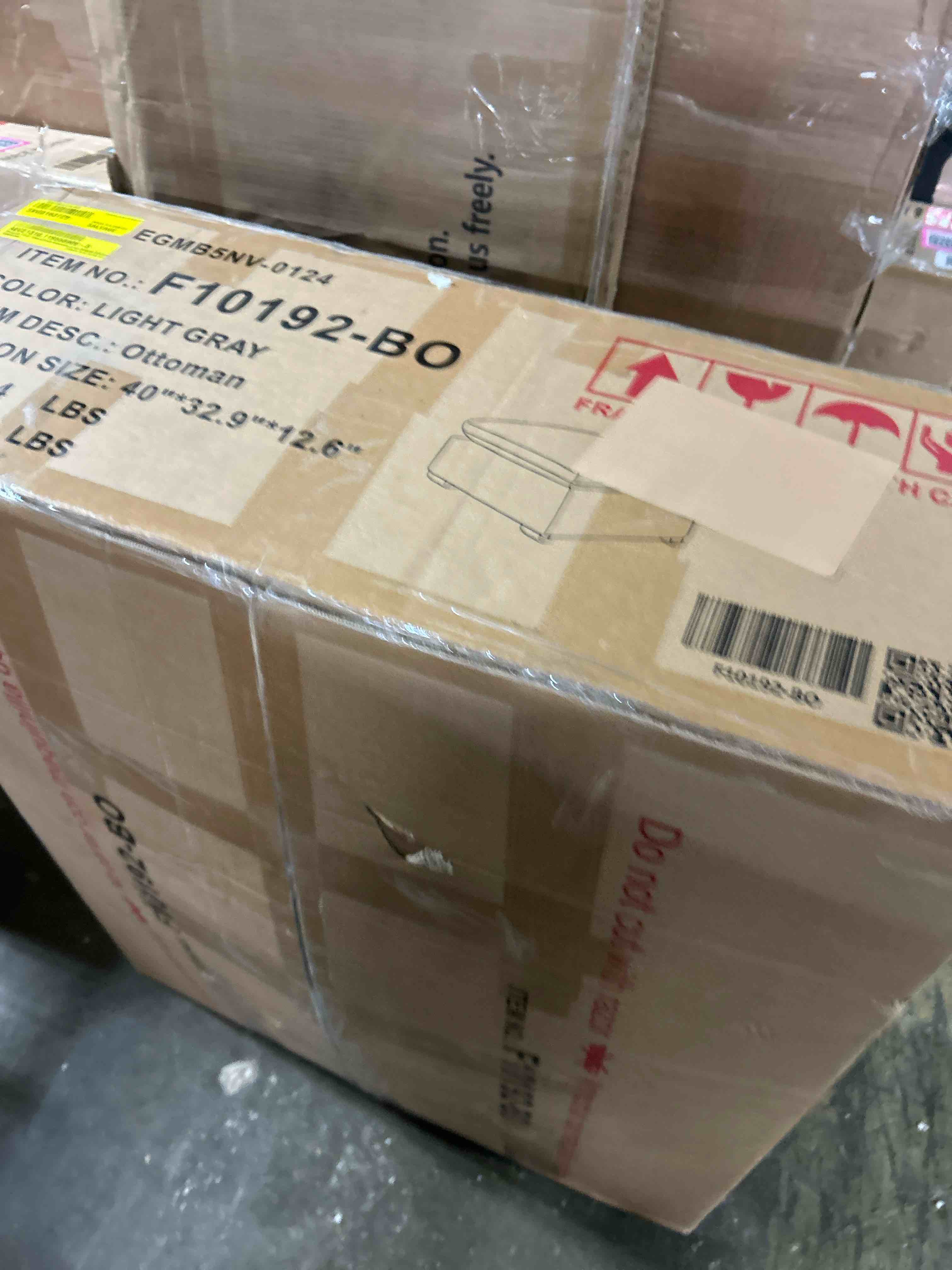 Condition photo showing New/Like New for signature design by ashley altari modern rectangular accent ottoman, light gray