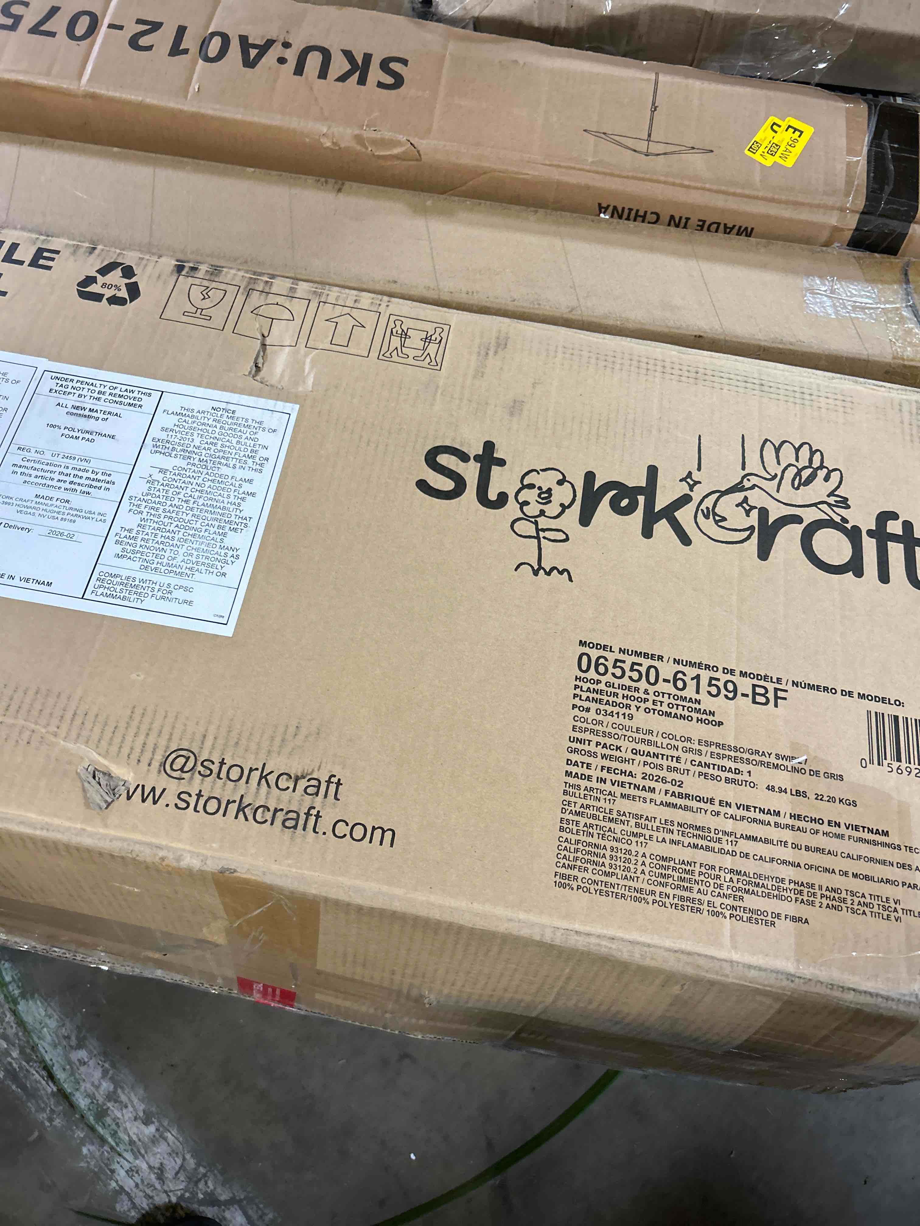 Condition photo showing New/Like New for storkcraft premium hoop glider & ottoman (espresso/gray swirl) — greenguard gold certified nursery glider, solid wood craftsmanship, smooth-gliding nursery chair and ottoman, award-winning