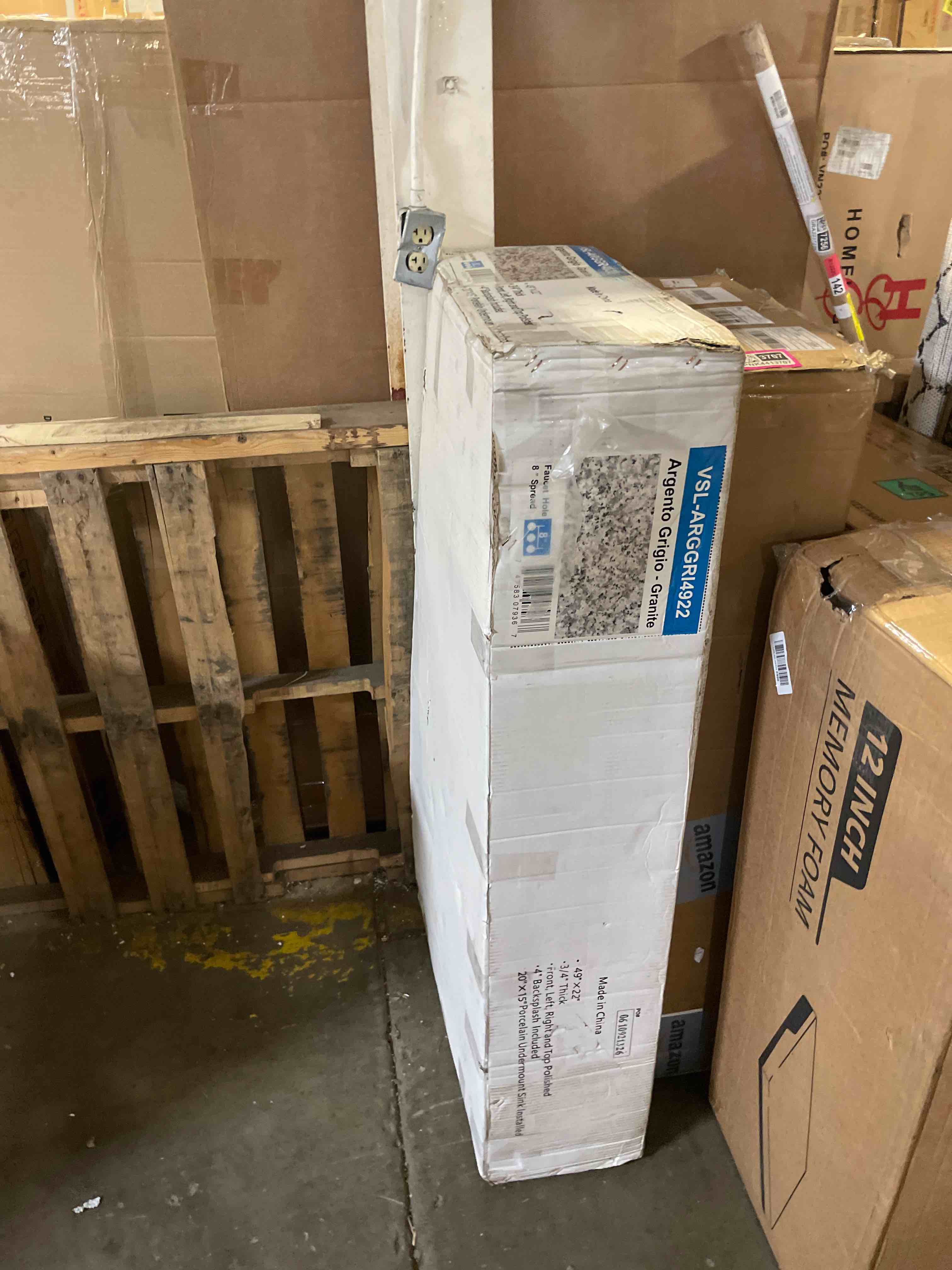 Condition photo showing As Is for valento gray 49 in. w x 22 in. d granite vanity top in gray with white rectangle single sink  (damaged)