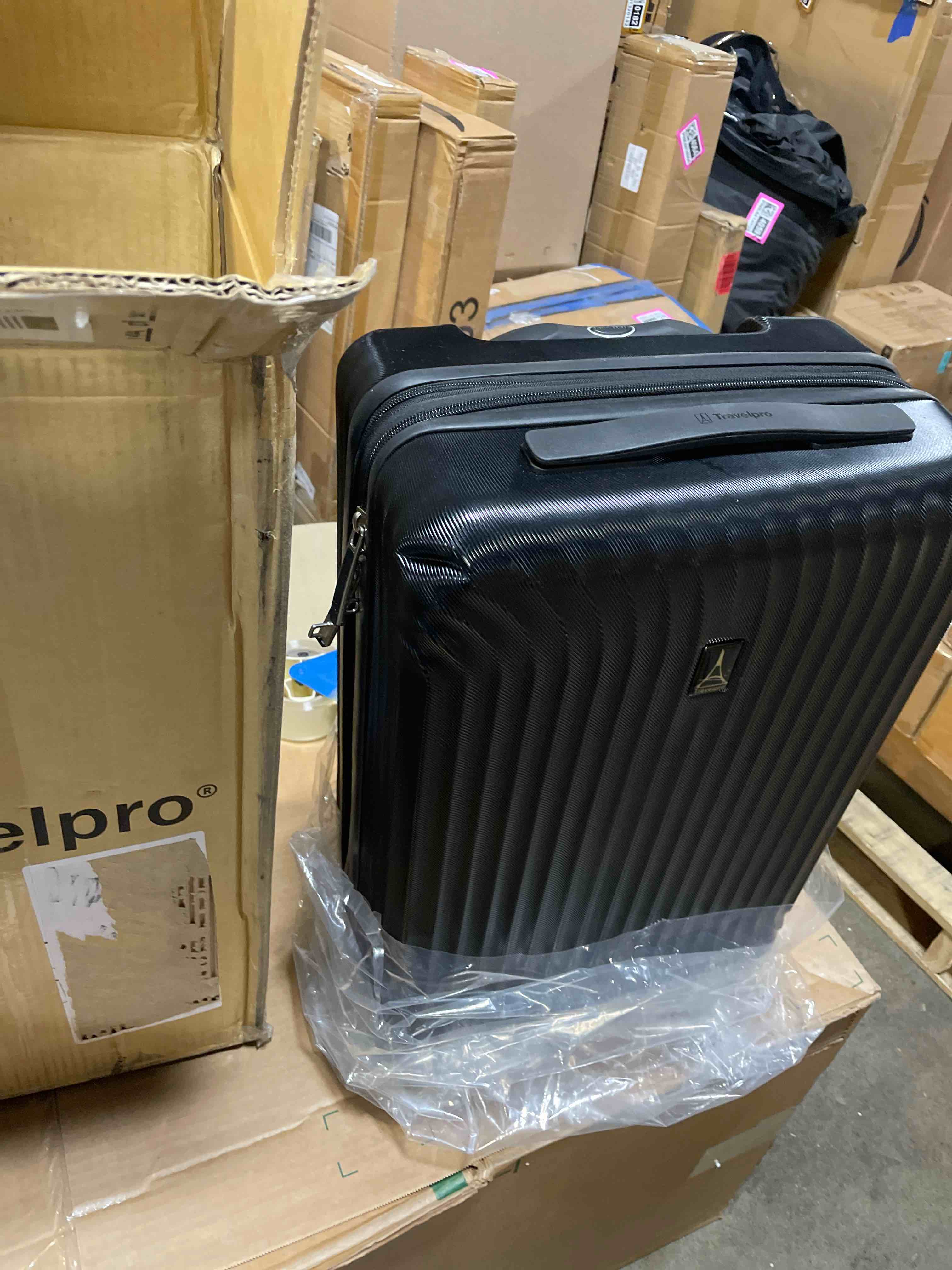 Condition photo showing Good Condition for Travelpro Maxlite Air Hardside Expandable Carry on Luggage, 8 Spinner Wheels, Lightweight Hard Shell Polycarbonate Suitcase, Black, Carry On 21-Inch