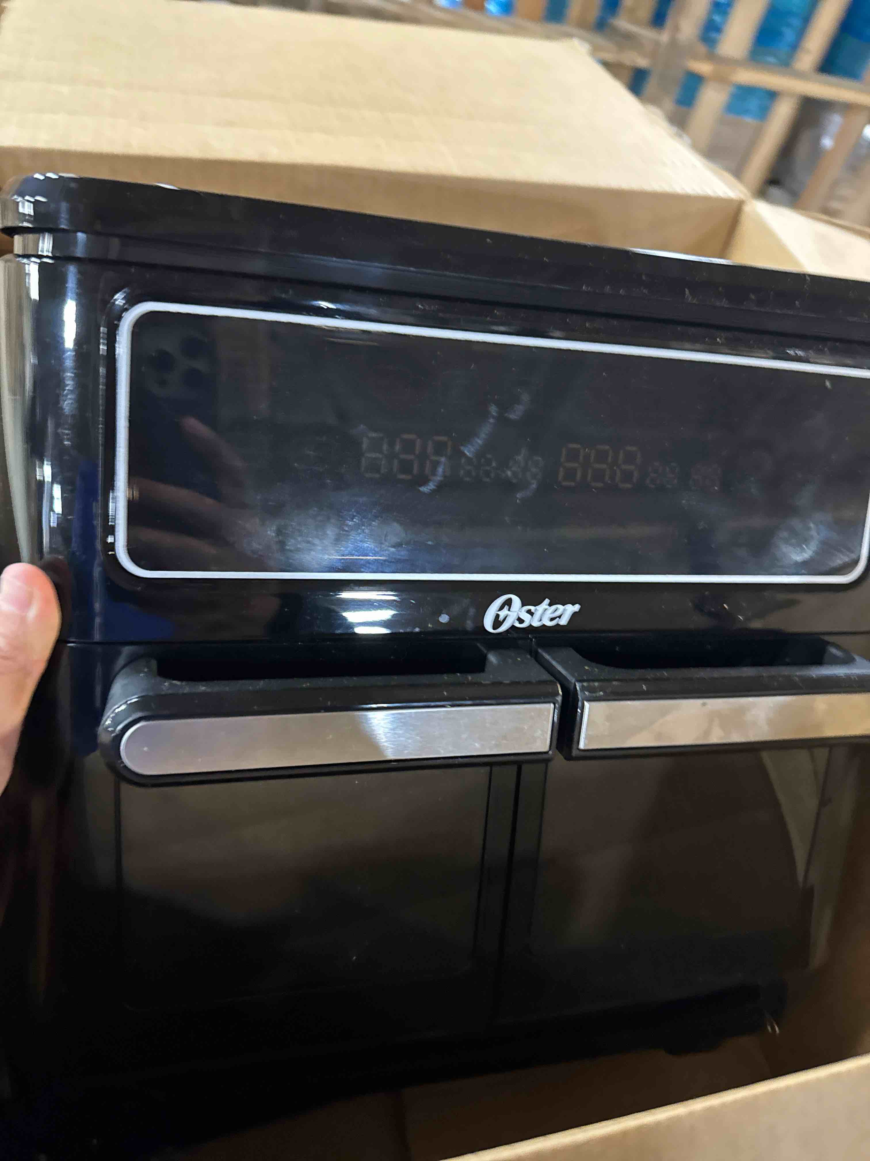 Condition photo showing As Is for Oster 11-Quart Dual Air Fryer Oven with 2 Cooking Zones, Large Capacity Air Fryer with 6 Cooking Functions & 2 Baskets