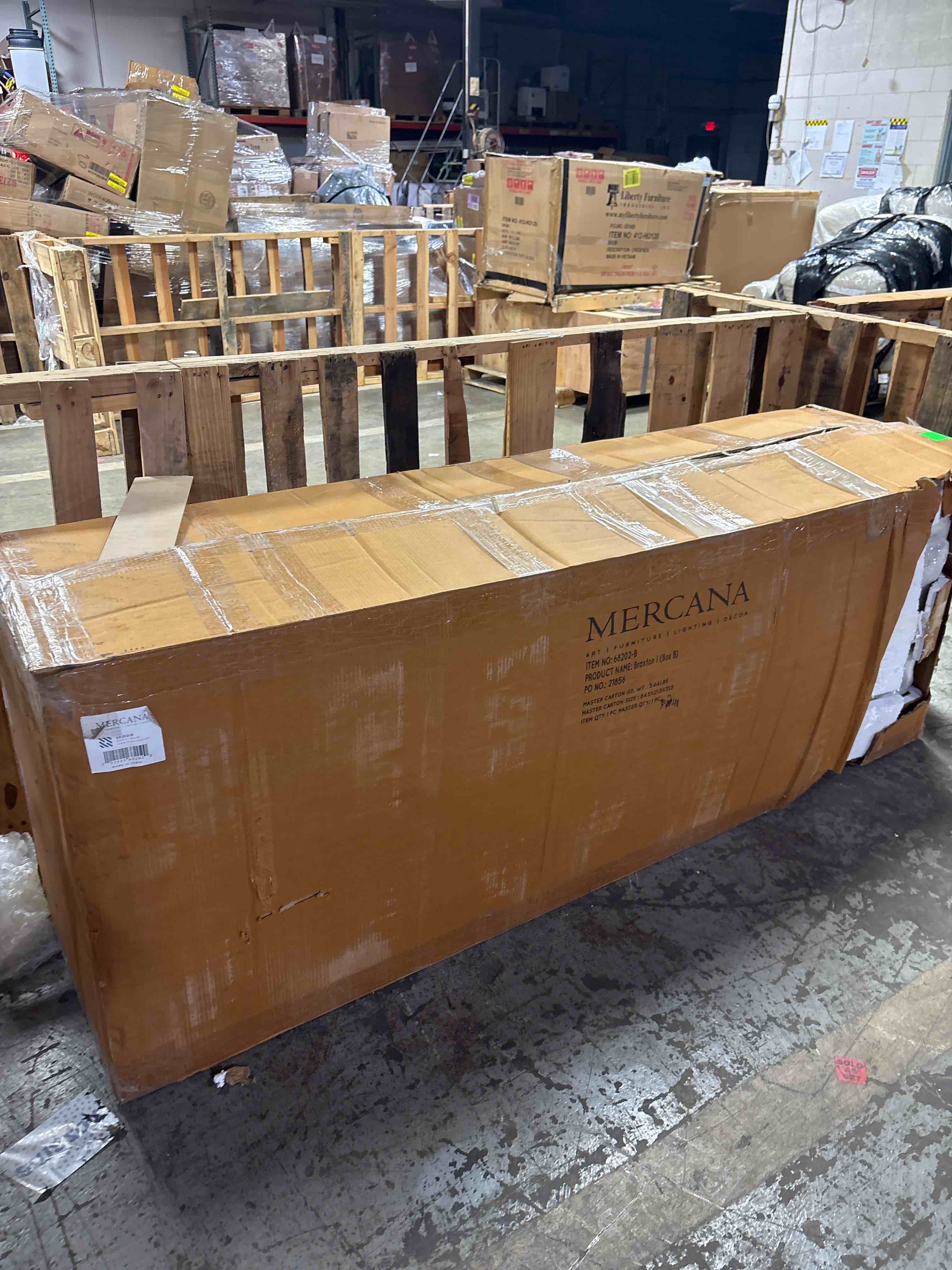 Condition photo showing Good Condition for Braxton I Light Brown Wood and Iron Three Shelf Shelving Unit 81.5L x 18.5W x 90 - 81.5"W x 18.5"D x 90"H  by Mercana