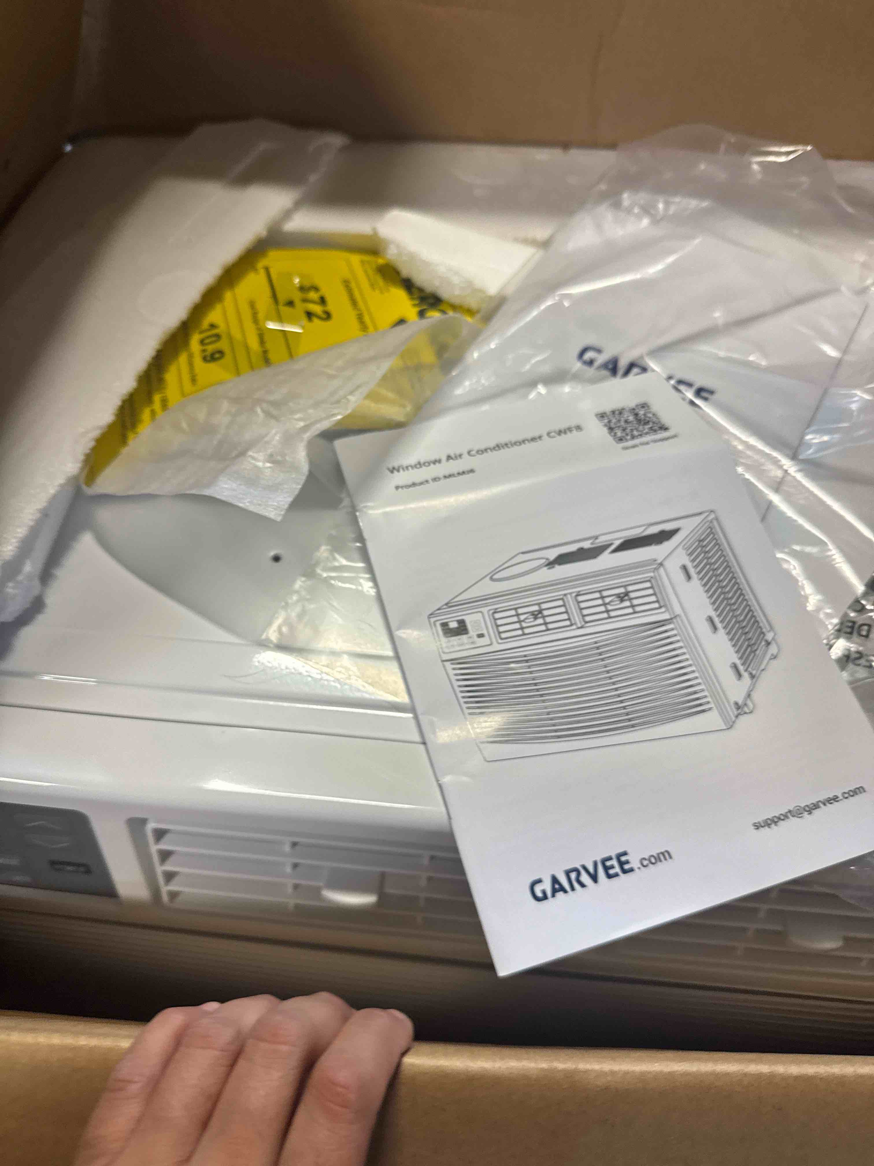 Condition photo showing Good Condition for garvee 8000 btu window air conditioner u-shaped with rc, high-efficiency cooling small window air conditioner with remote control and washable filter, quiet operation, cooling up to 250 sq ft, 115v/60hz ( has a dent on corner shown in pictures)