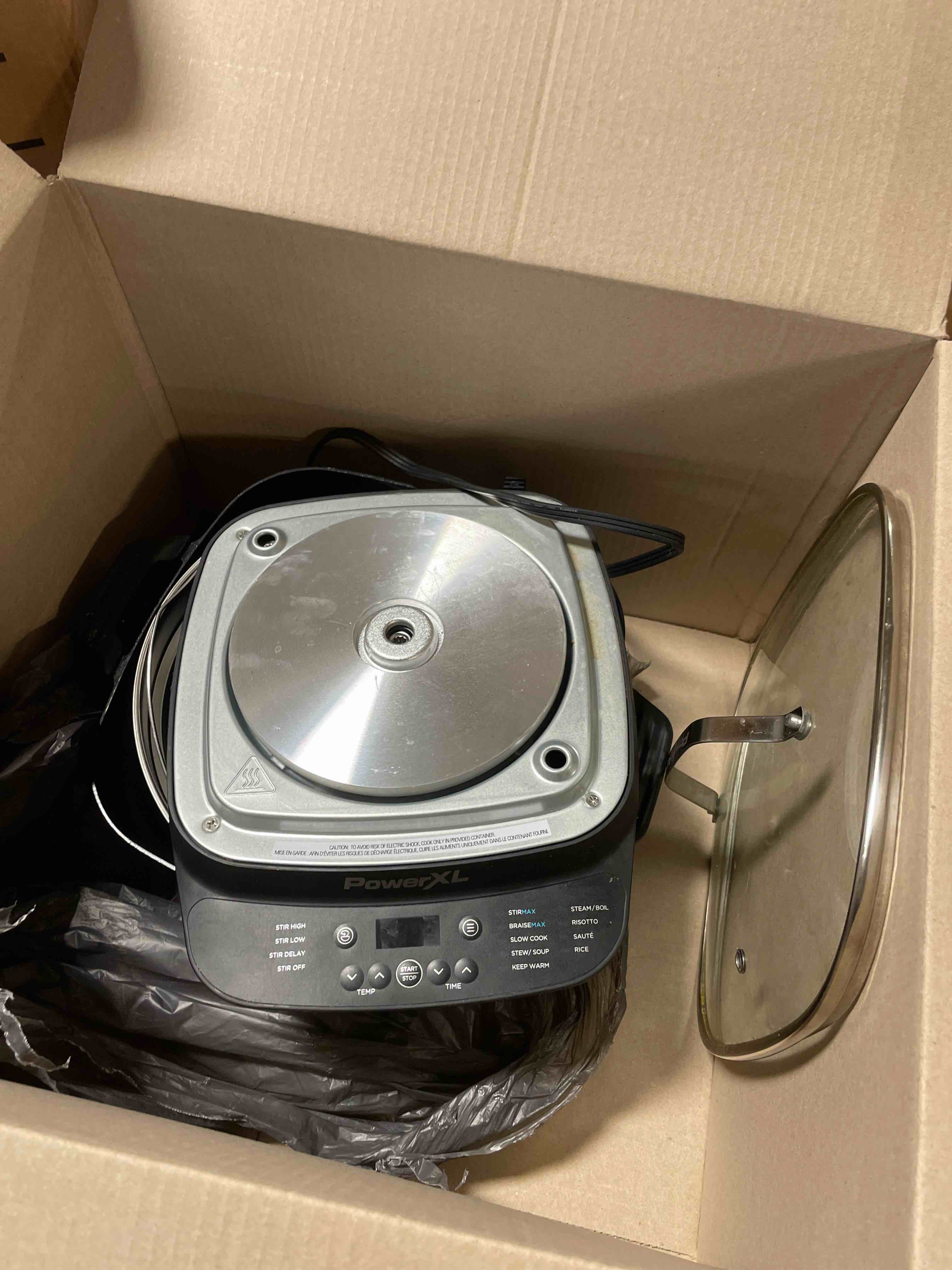 Condition photo showing Good Condition for STIRMAX PLUS 7.5 Quart Digital Multi-Cooker with Automatic Paddle to Stir and Shred, 9 in 1 programmable presets to Sauté, Sear, and Brown Food Before Simmering – Accessories & Cookbook Included (Used)