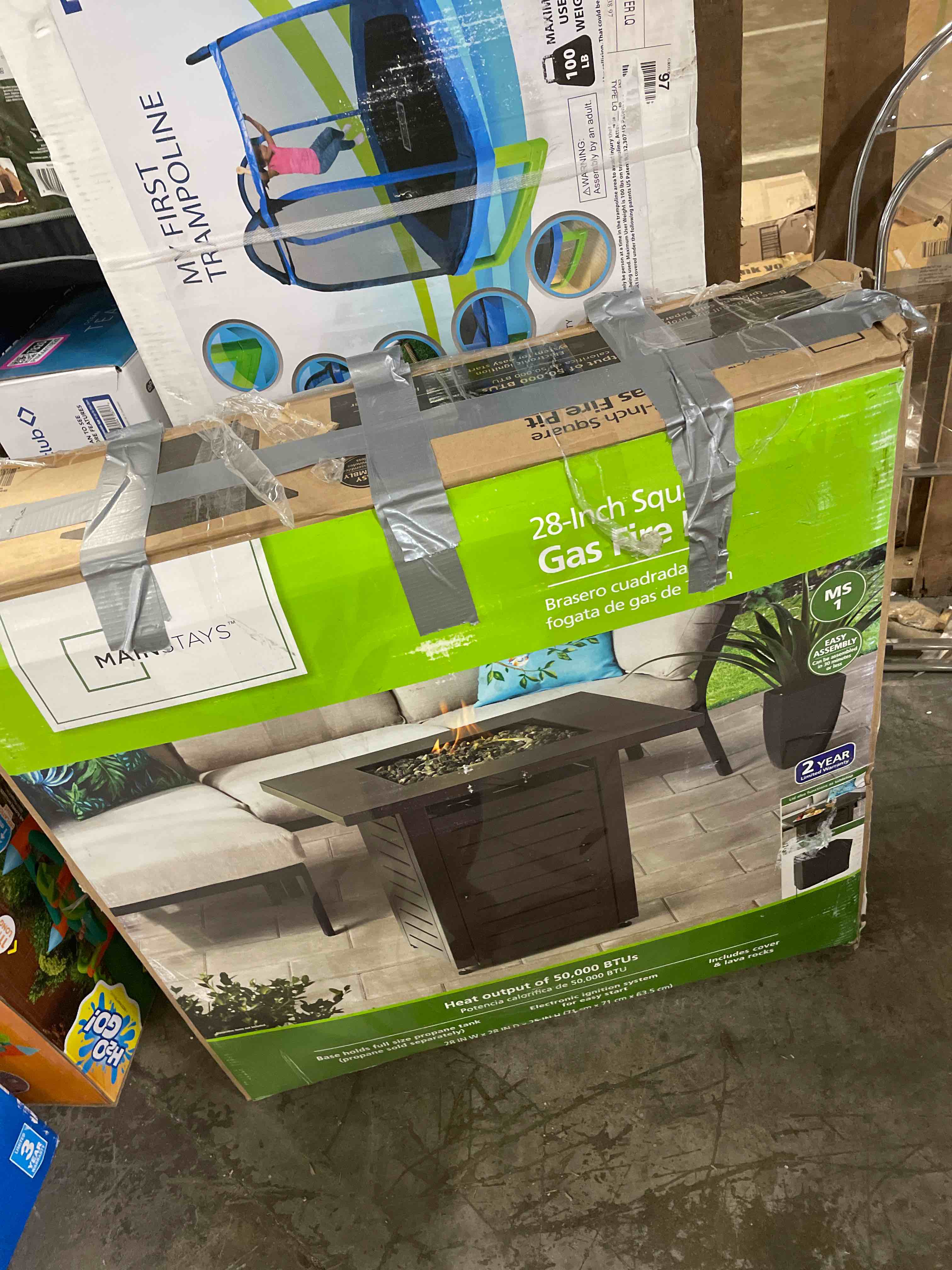 Condition photo showing Good Condition for Mainstays 28  Square 50000 BTU Propane Gas Fire Pit Table with Lava Rocks  Metal Lid and Protective Cover