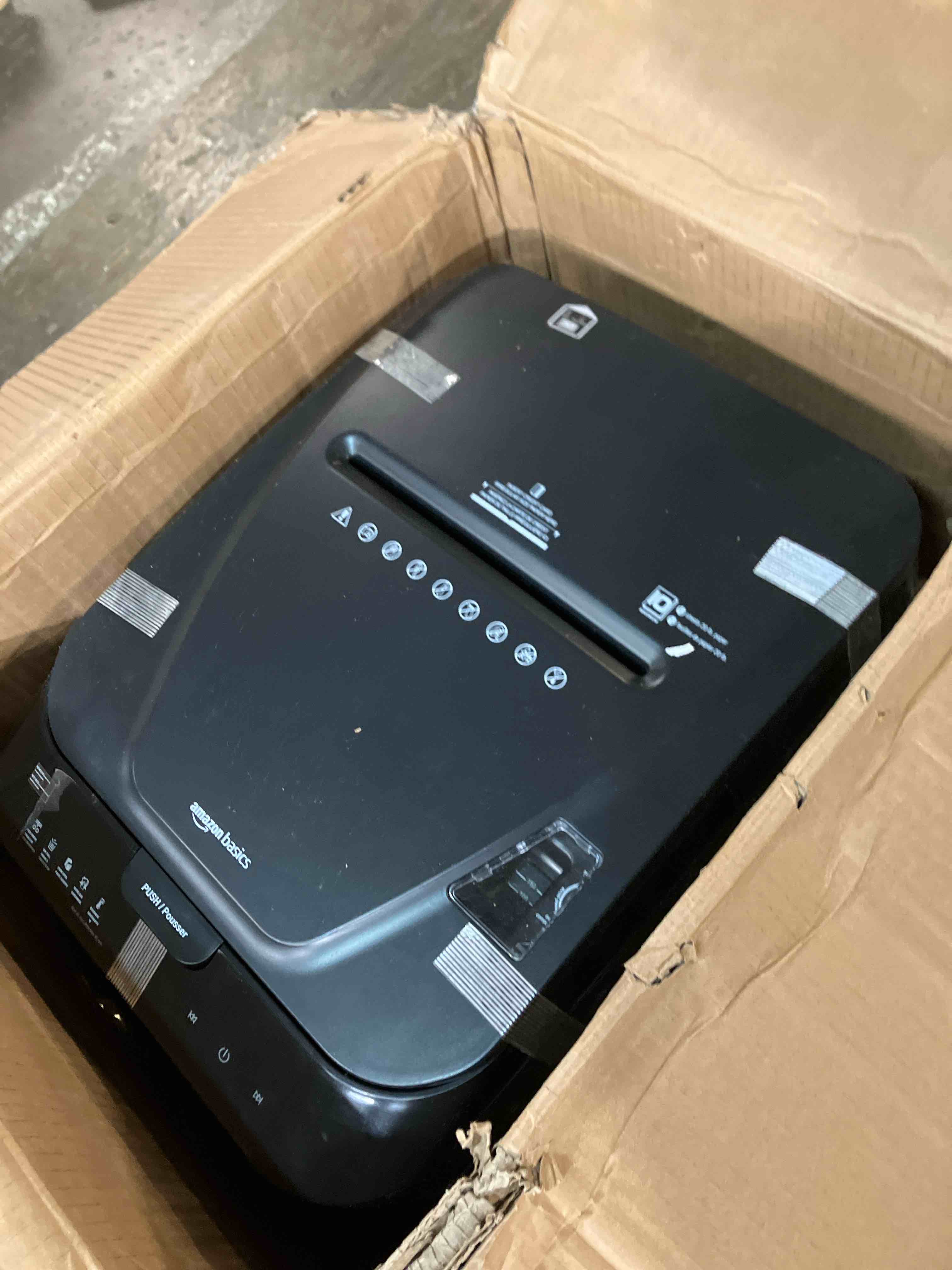 Condition photo showing As Is for Amazon Basics 150 Sheet Autofeed Micro Cut Paper Credit Card Shredder for Security, Black (Doesn’t work sold for parts)