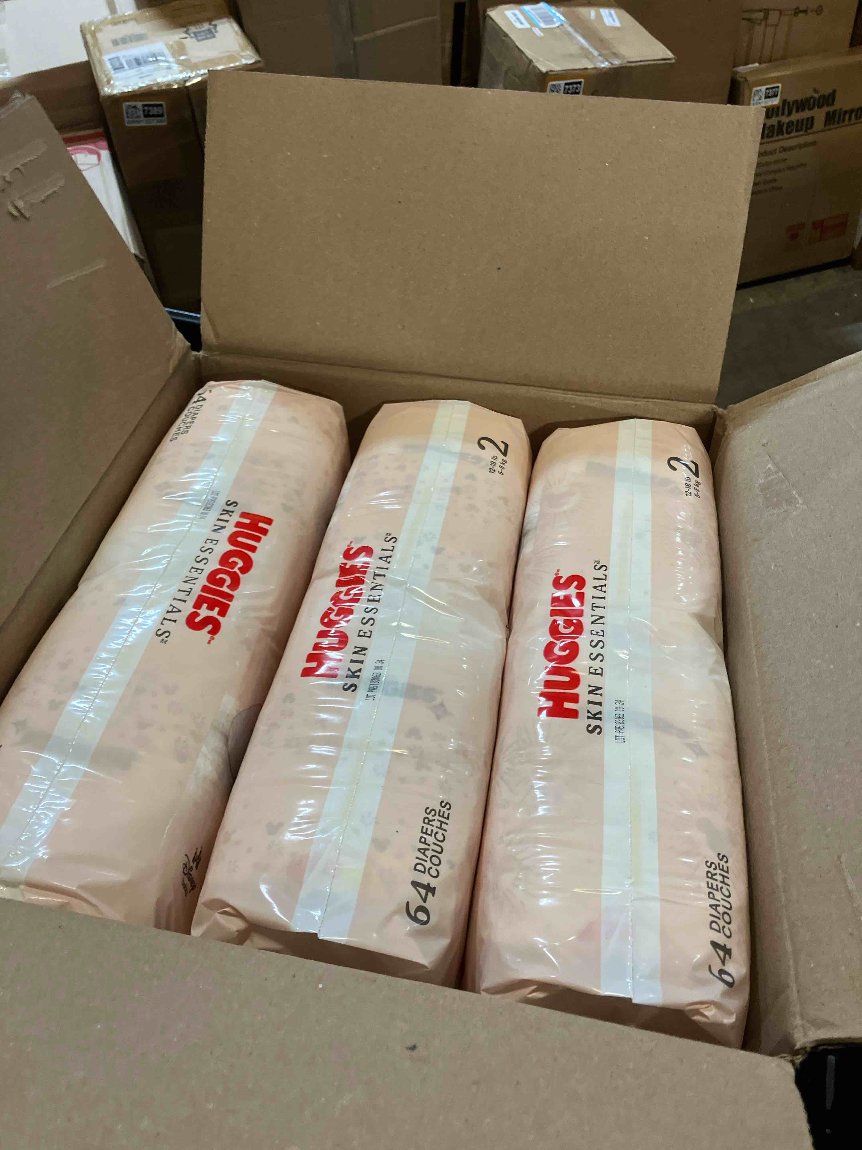 Condition photo showing New/Like New for Huggies Size 2 Diapers, Skin Essentials Baby Diapers, Size 2 (12-18 lbs), 192 Count (3 Packs of 64), Packaging May Vary Size 2 192