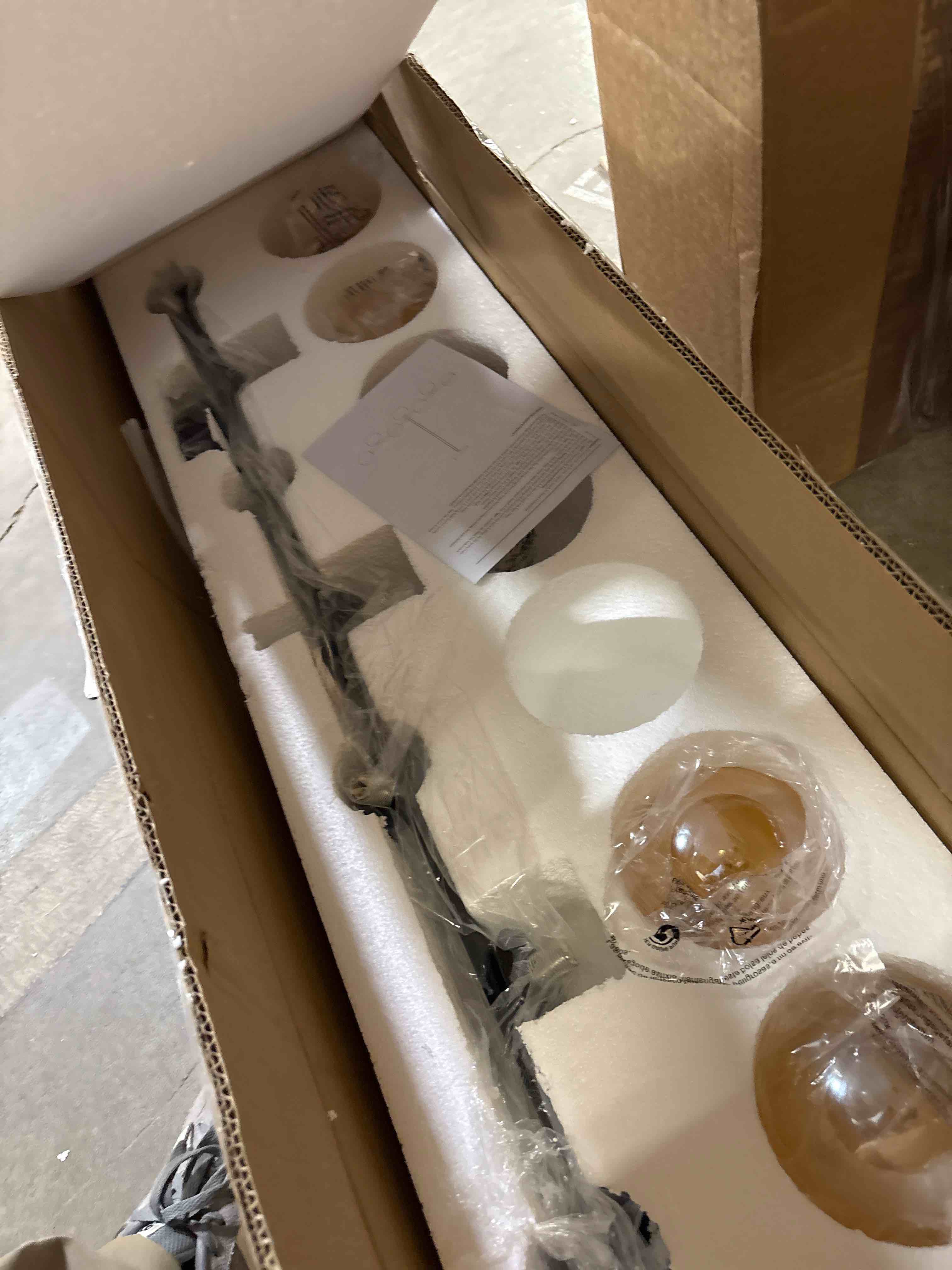 Condition photo showing As Is for Kason Modern 7-Lights linear globe chandelier By Mercer41