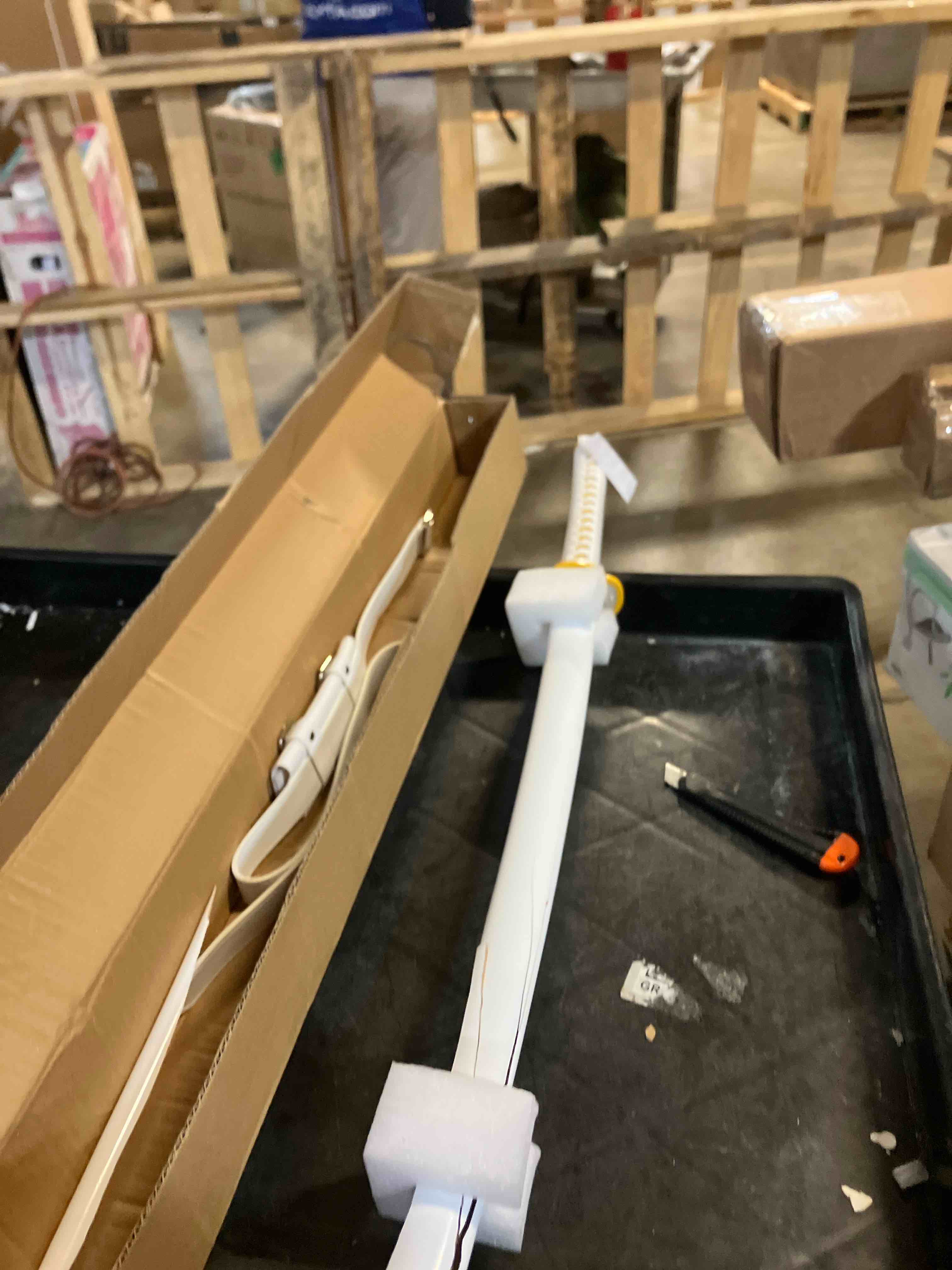 Condition photo showing As Is for RENGENG Light Up Sword, 40 Inches Rechargeable Plastic Replica with Belt & Stand, Sword with Original Texture