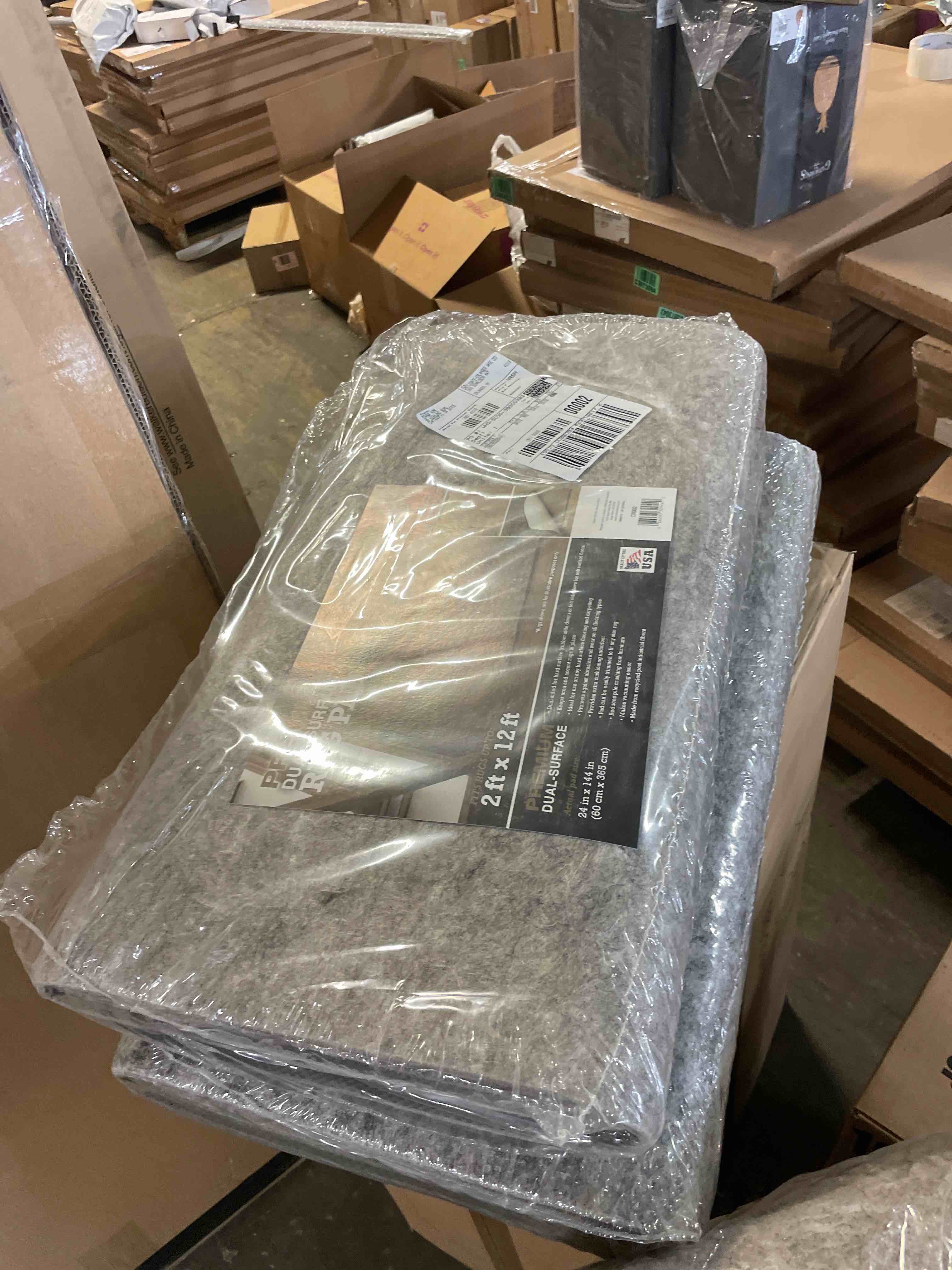 Condition photo showing New/Like New for mohawk home 2' x 12' non slip rug pad gripper 1/4 thick dual surface felt + rubber gripper - safe for all floors, brown