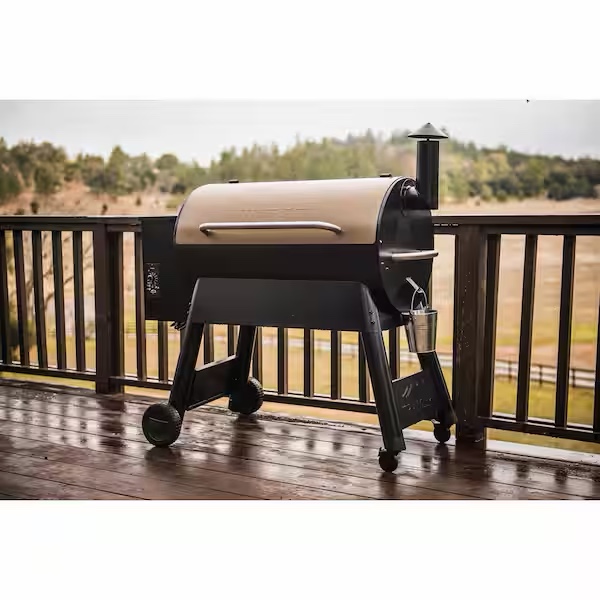 pro series 34-pellet grill and smoker in bronze, 884 sq. in cooking space, heat thermometer, rust resistant, automatic auger, 4 all terrain wheels, overall dimensions 53 w x 49 h x 27 d, scratch and dent item, (pictured)