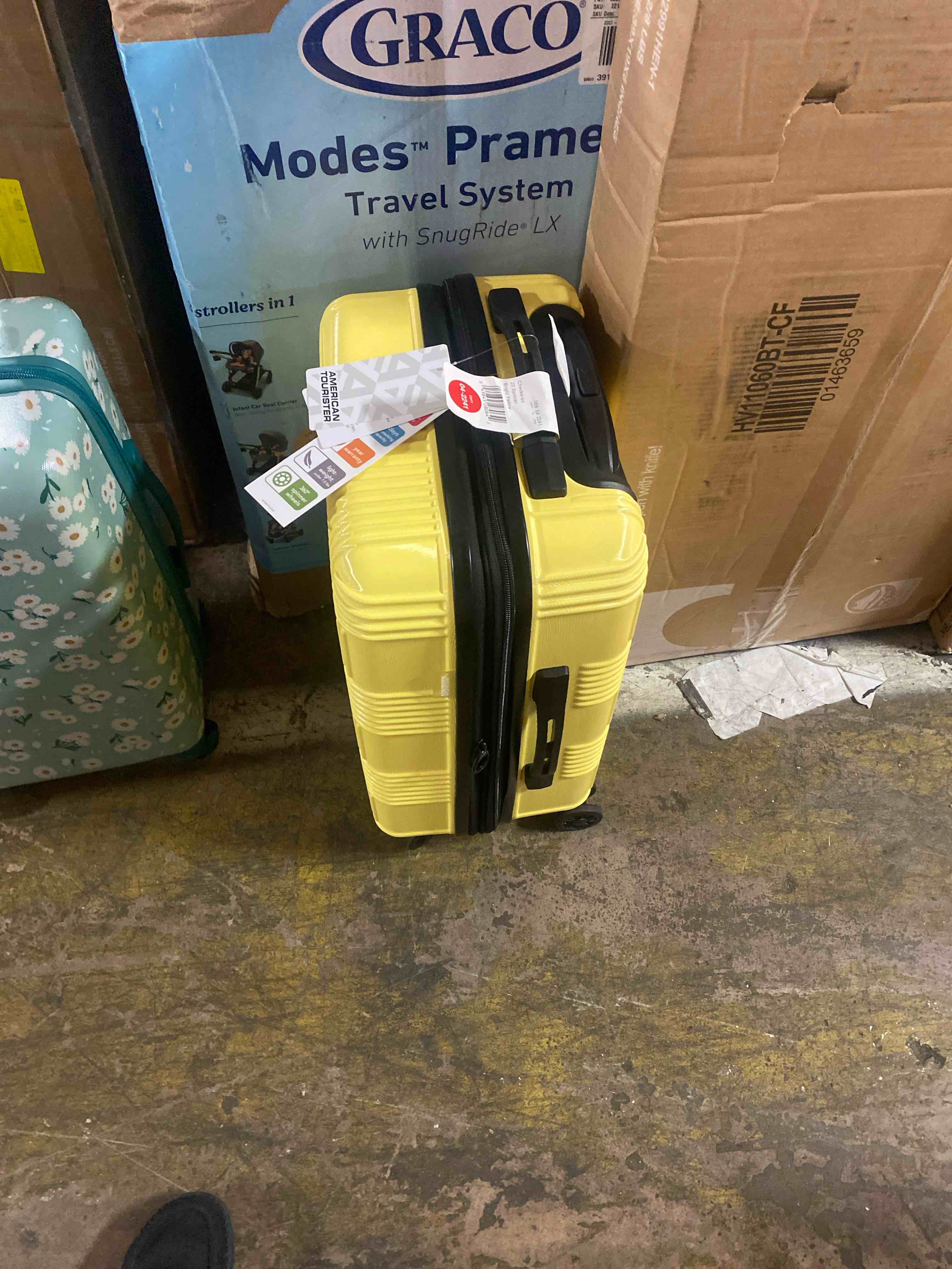 Condition photo showing New/Like New for american tourister nxt checkered hardside carry on spinner suitcase - yellow