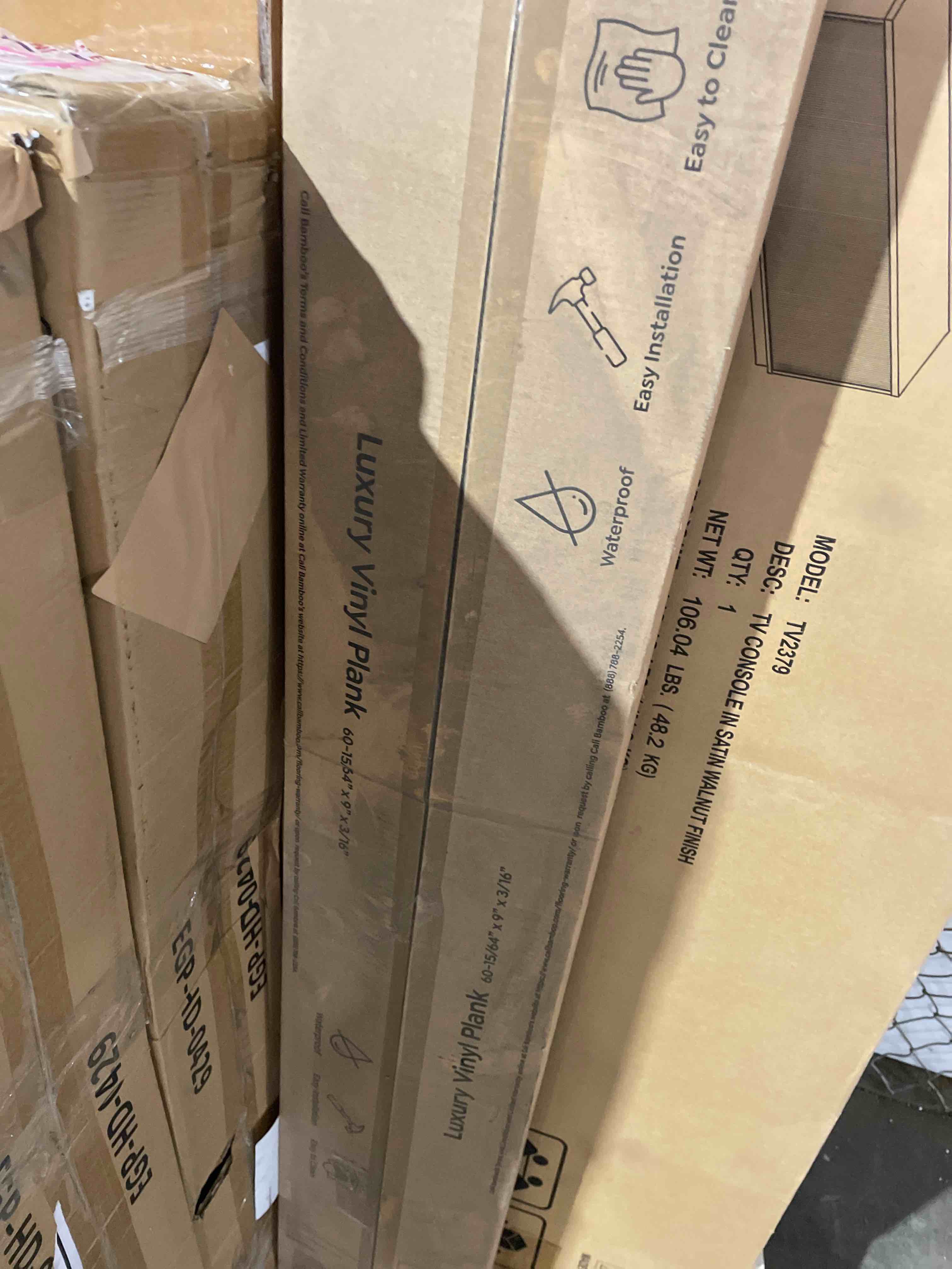 Condition photo showing New/Like New for aqua-defy aqua defy skyline pine 20 mil x 9 in. w x 60 in. l click lock waterproof luxury vinyl plank flooring (37.5 sqft/case), medium