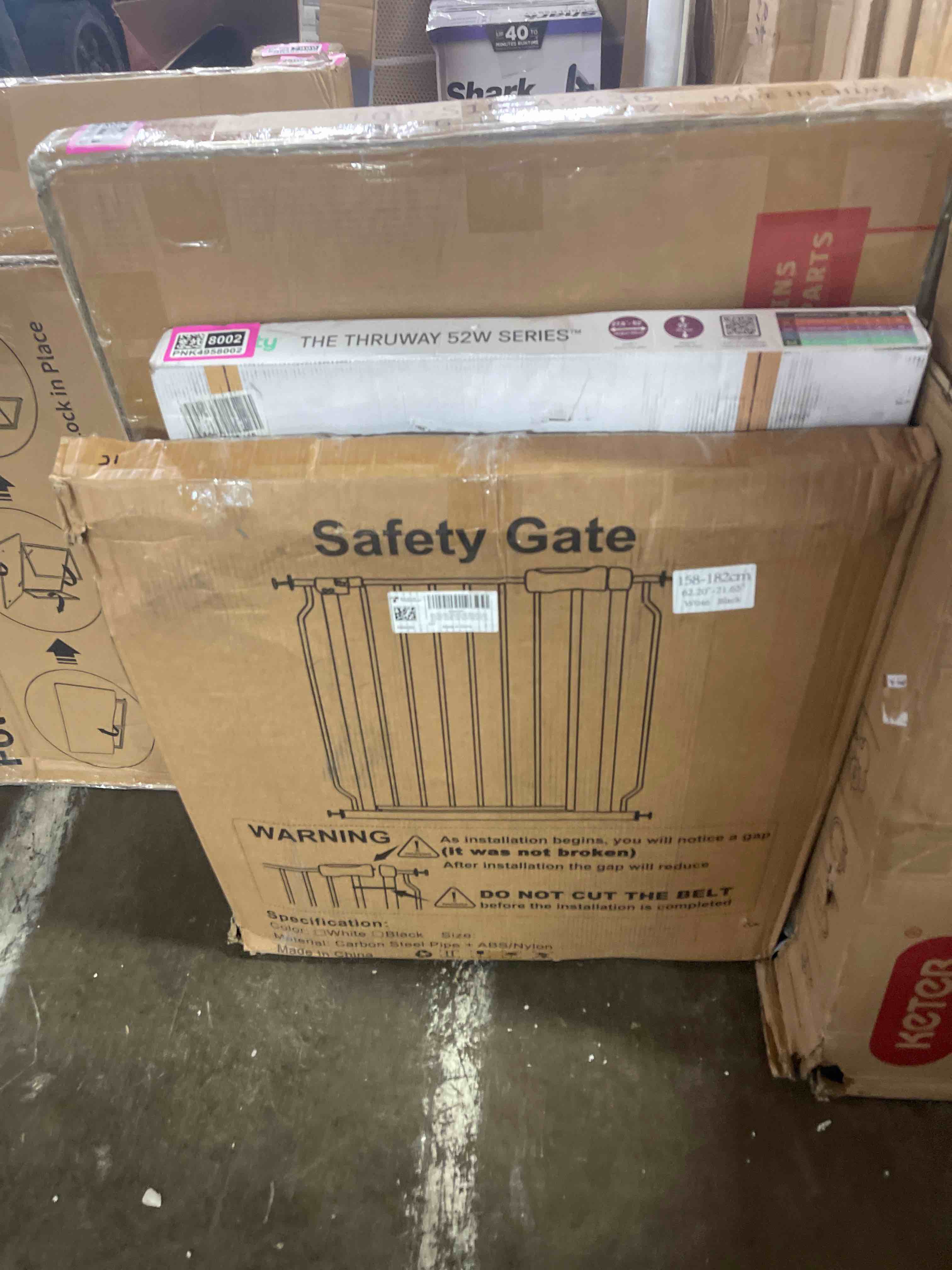Condition photo showing New/Like New for regalo safety 36" extra tall baby gate for doorways & bottom of stairs, pressure mounted walk through gate for babies, toddlers & pets, tested & safe for 30 years, american designed, american owned black 29-36.5"w x 36"h