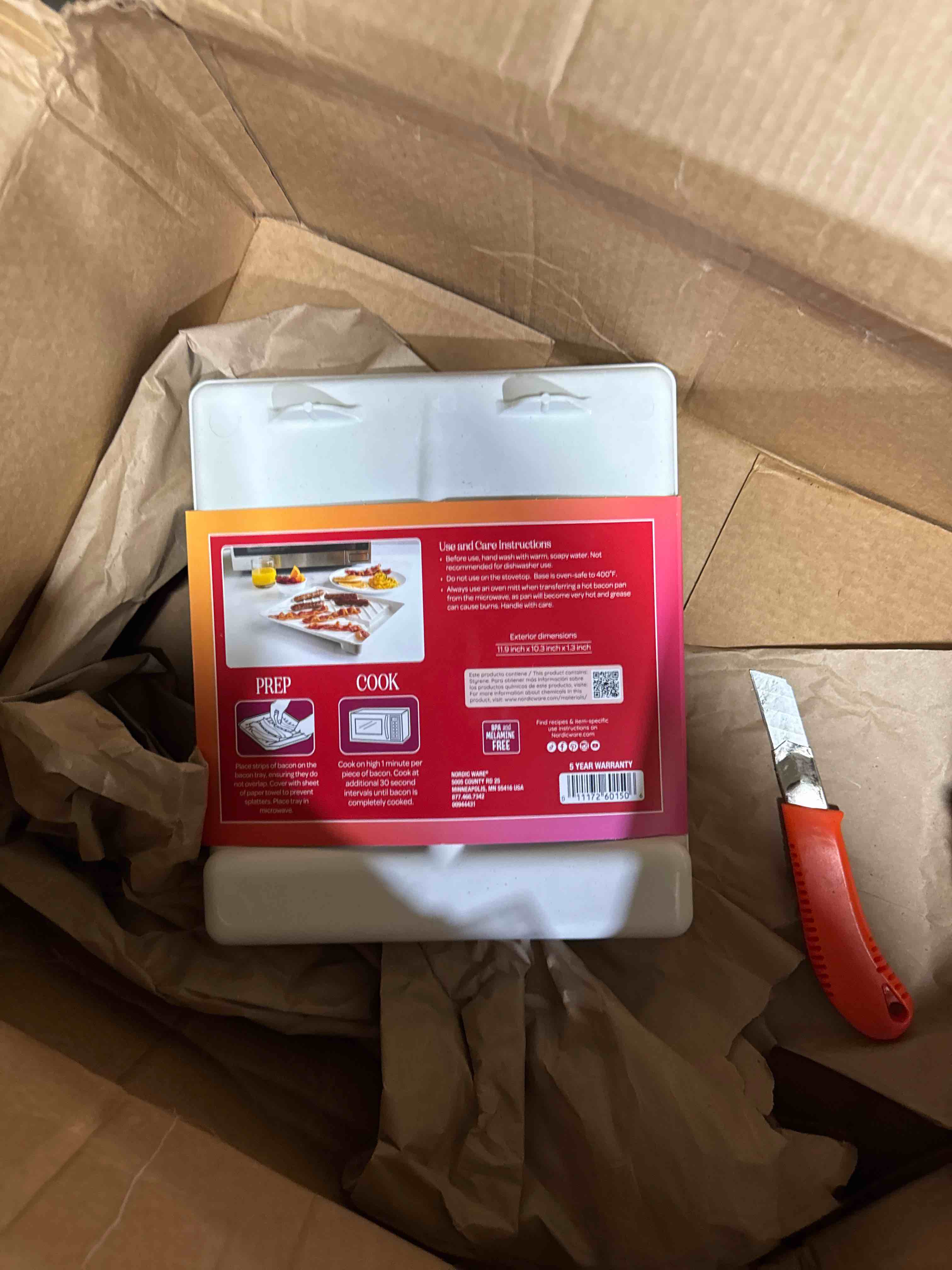 Condition photo showing As Is for nordic ware microwave bacon tray & food defroster