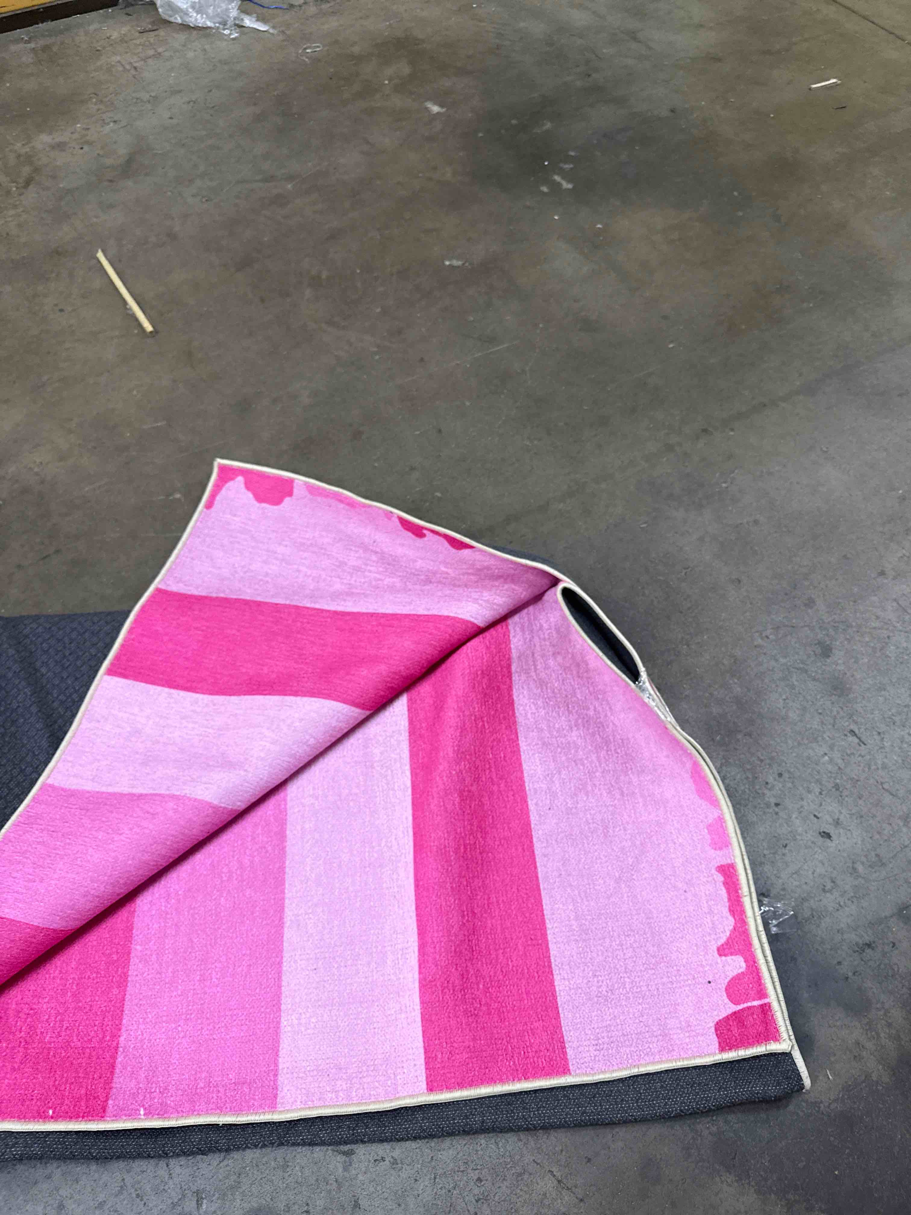 Condition photo showing Good Condition for hot pink striped geometric area rug - 6x9 ft - contemporary carpet - home decor
