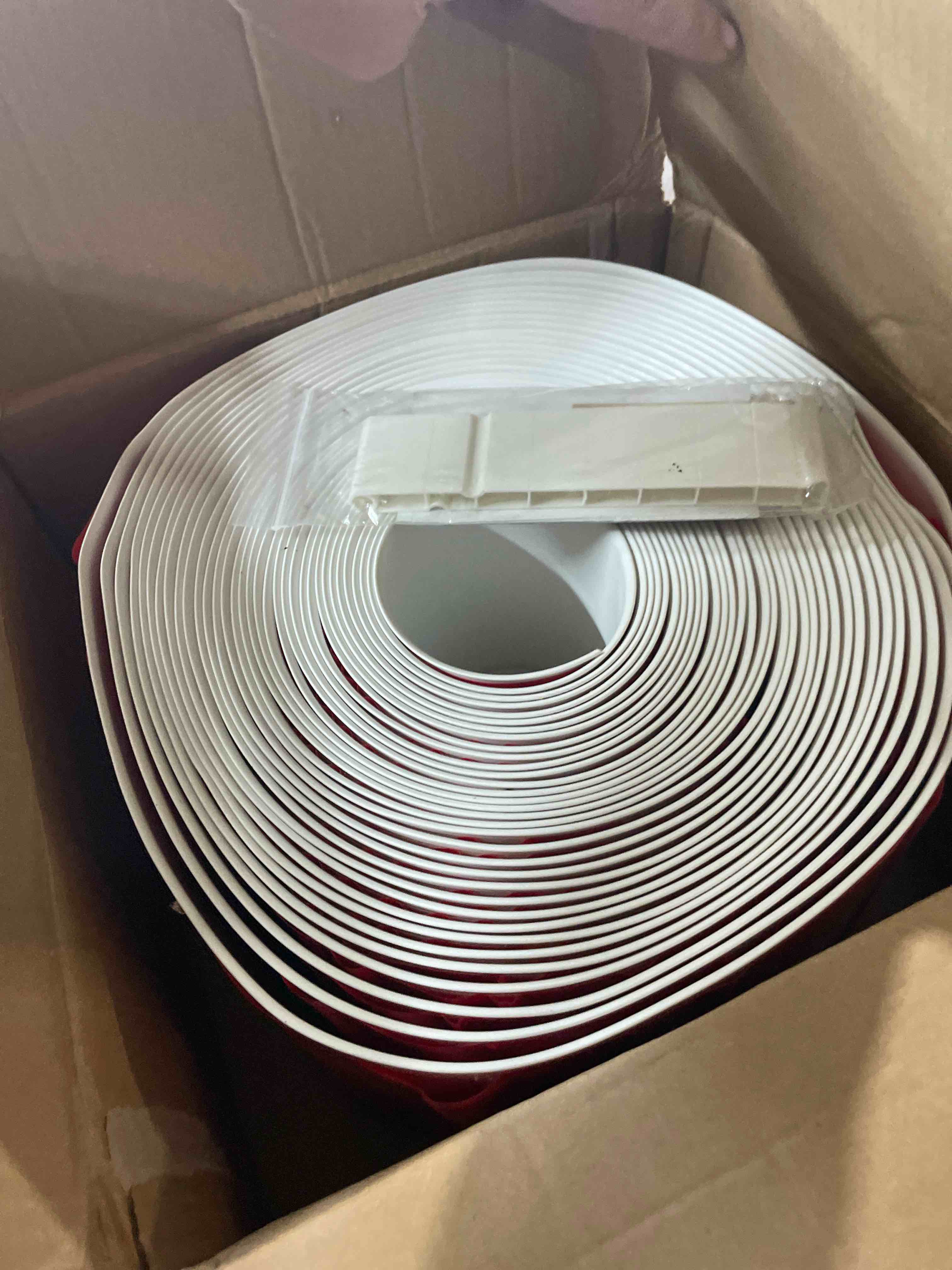 Condition photo showing New/Like New for duzzy flexible baseboard molding trim, 6 inch(w) x 60 feet(l) peel and stick rubber wall trim molding, self-adhesive vinyl wall base cove base