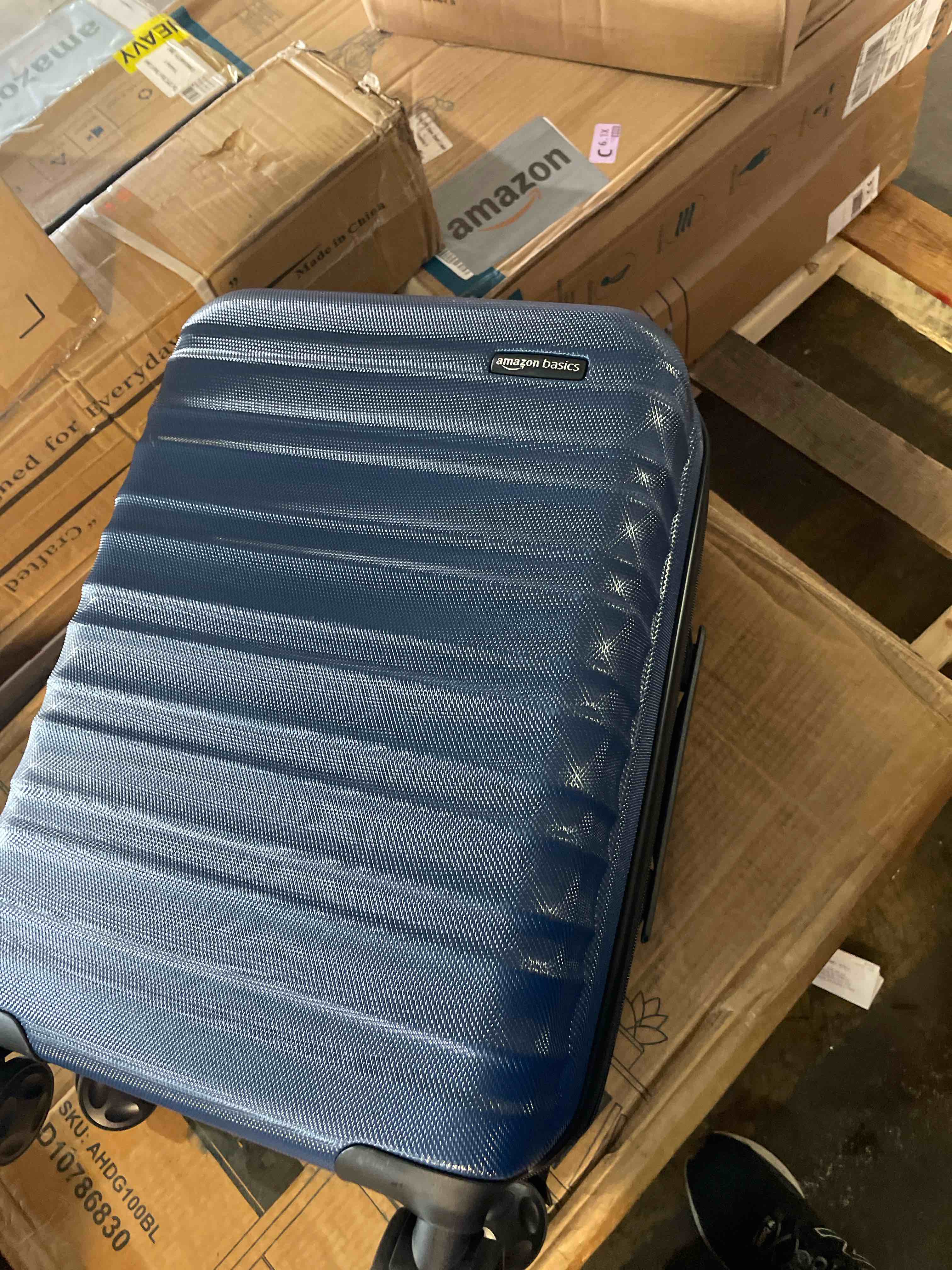 Condition photo showing New/Like New for amazonbasics 68 cm navy blue hardsided check-in trolley navy blue medium checked