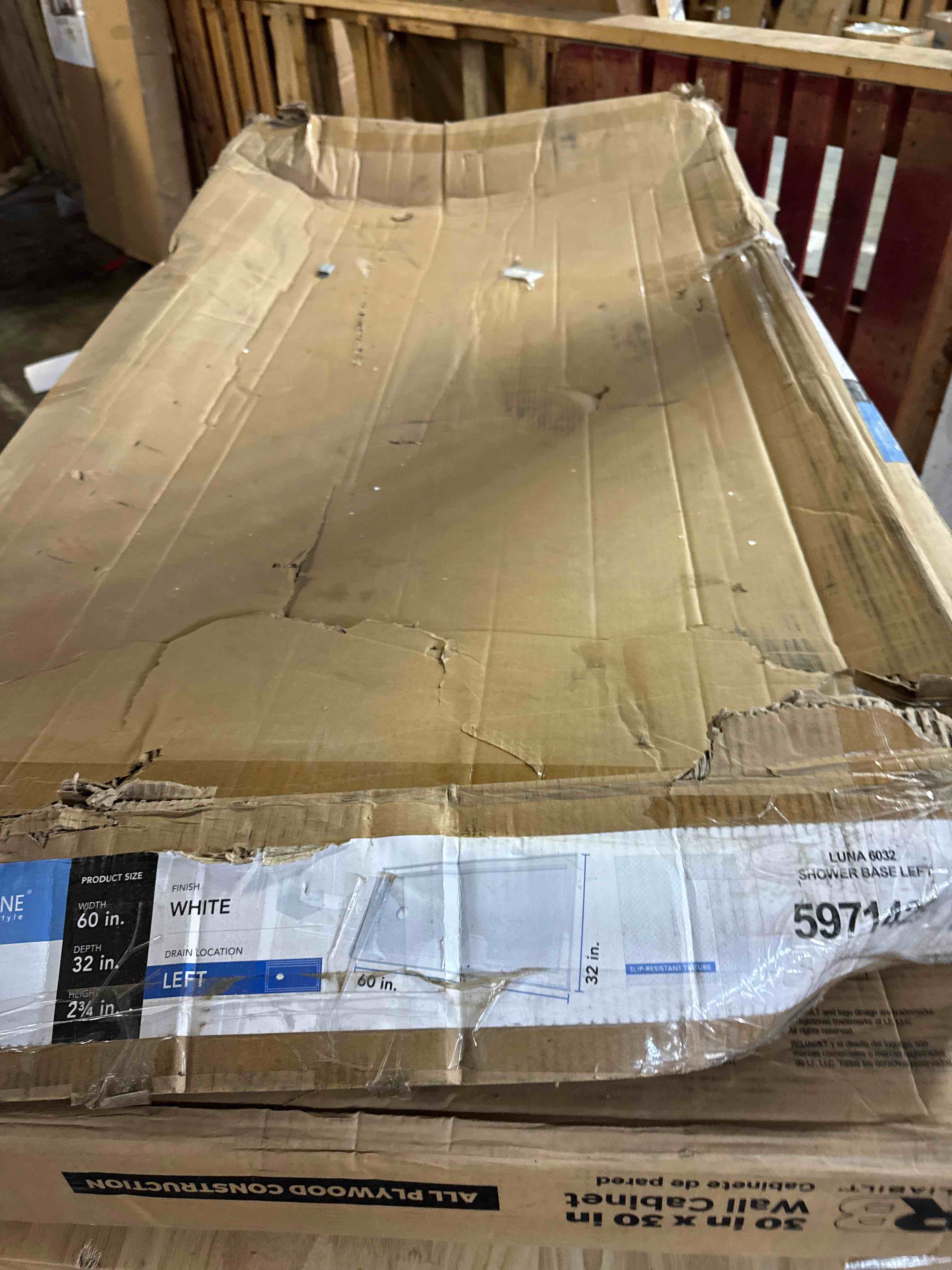 Condition photo showing As Is for dreamline slimline 32 in. d x 60 in. w x 2 3/4 in. h left drain single threshold shower base in white, dlt-1132601