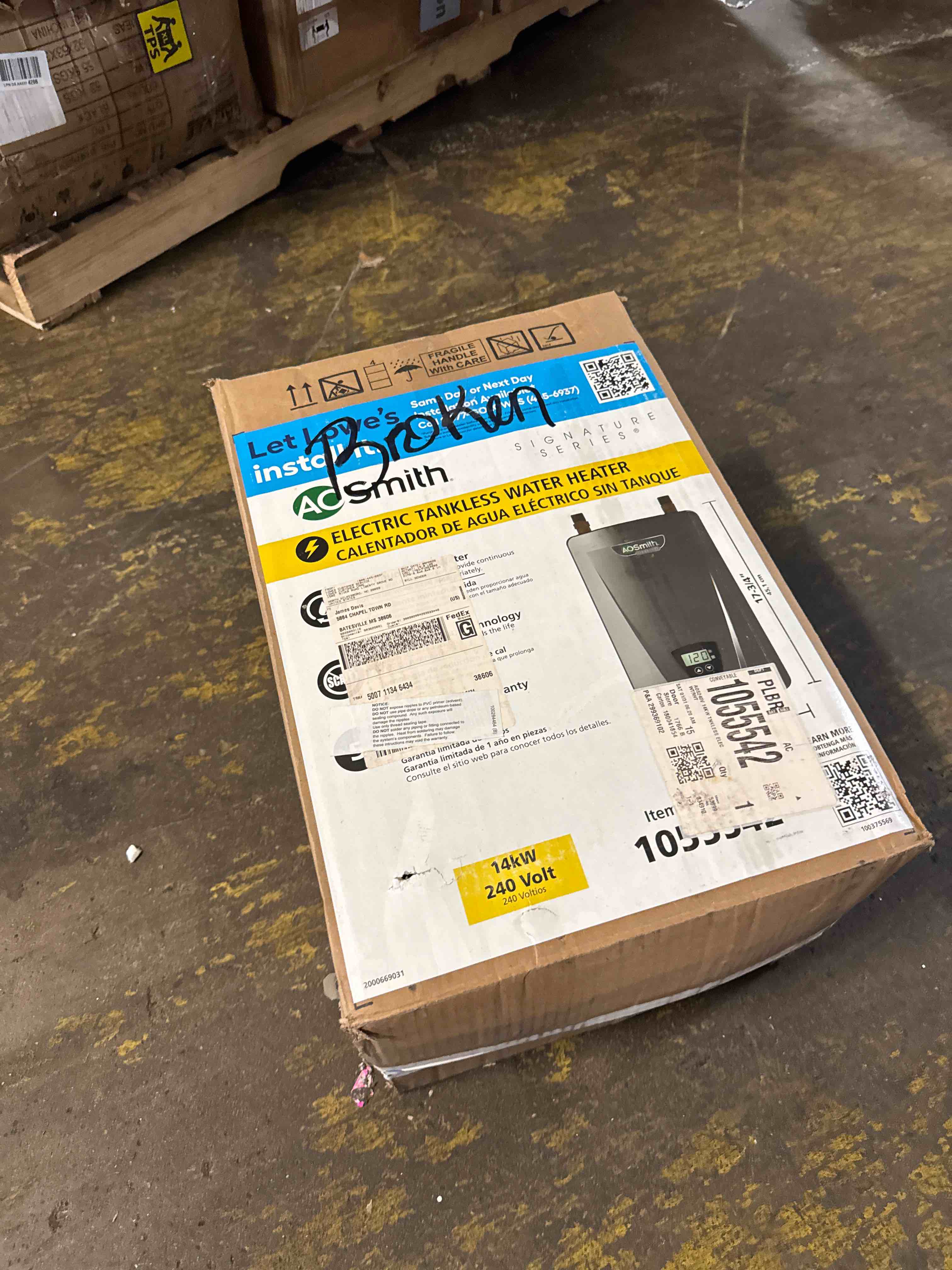 Condition photo showing As Is for o. smith signature series 240-volt 28-kw 5.5-gpm tankless electric water heater ( sold for part)