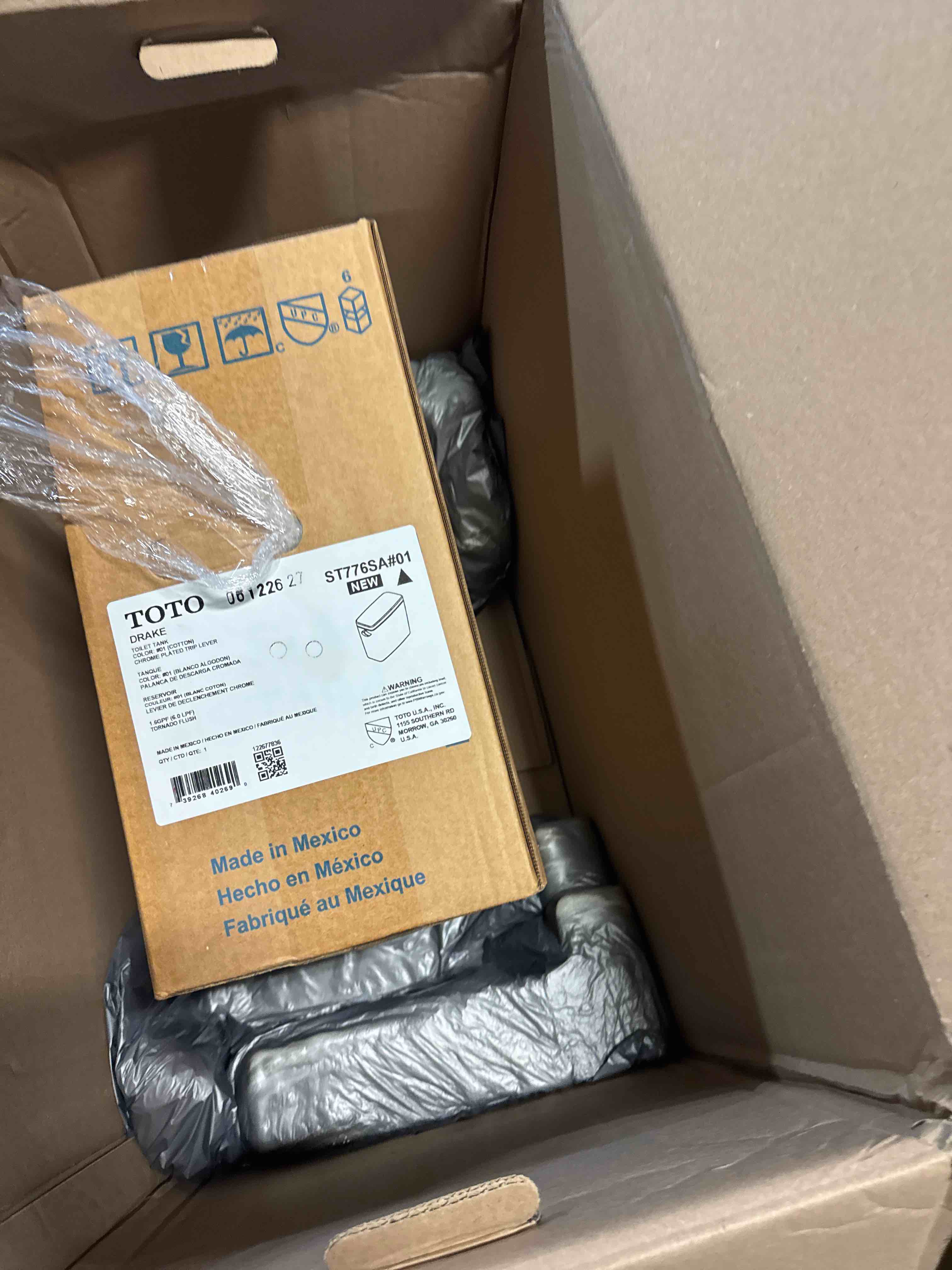 Condition photo showing New/Like New for toto drake two-piece elongated 1.6 gpf universal height tornado flush toilet with cefiontect, cotton white - cst776csfg#01