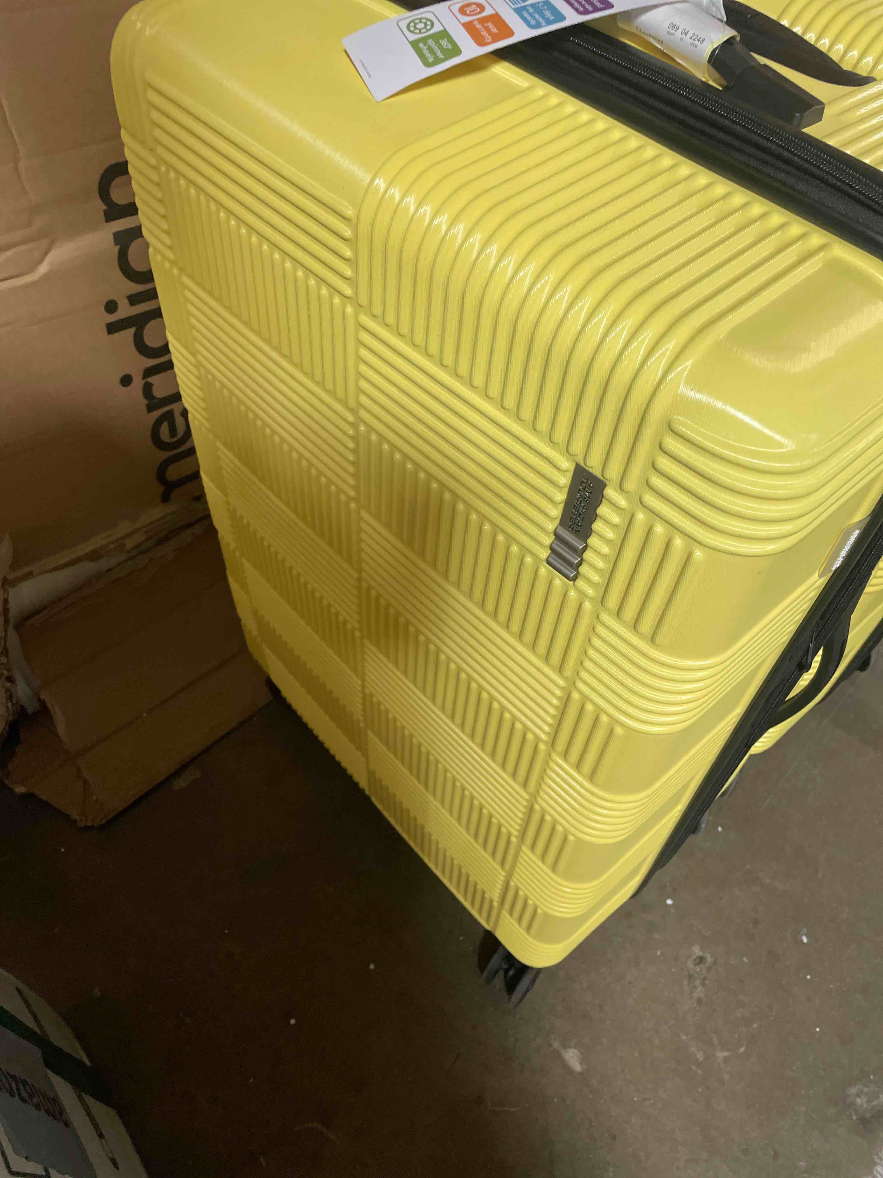 Condition photo showing New/Like New for american tourister nxt hardside large checked spinner suitcase - yellow: 8-wheel durable abs